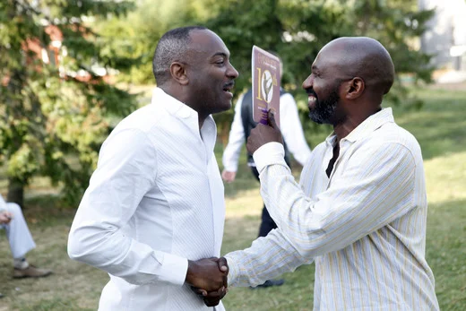 Evidence Chair Reginald Van Lee with Ron K. Brown. Photo Credit Getty Images