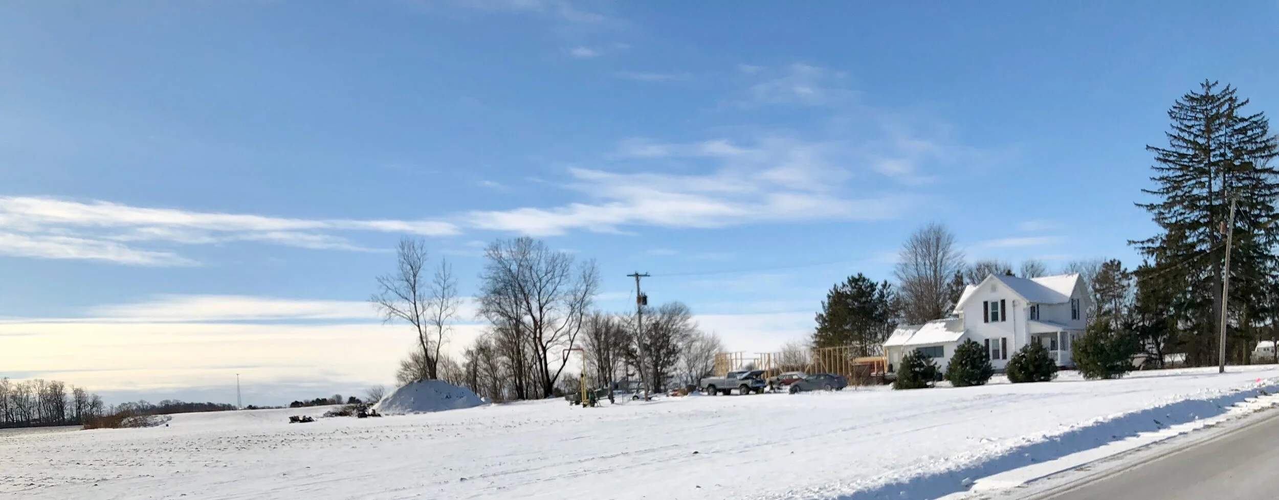 Slope house where Joan and I started. Barn is gone and new garage going up.