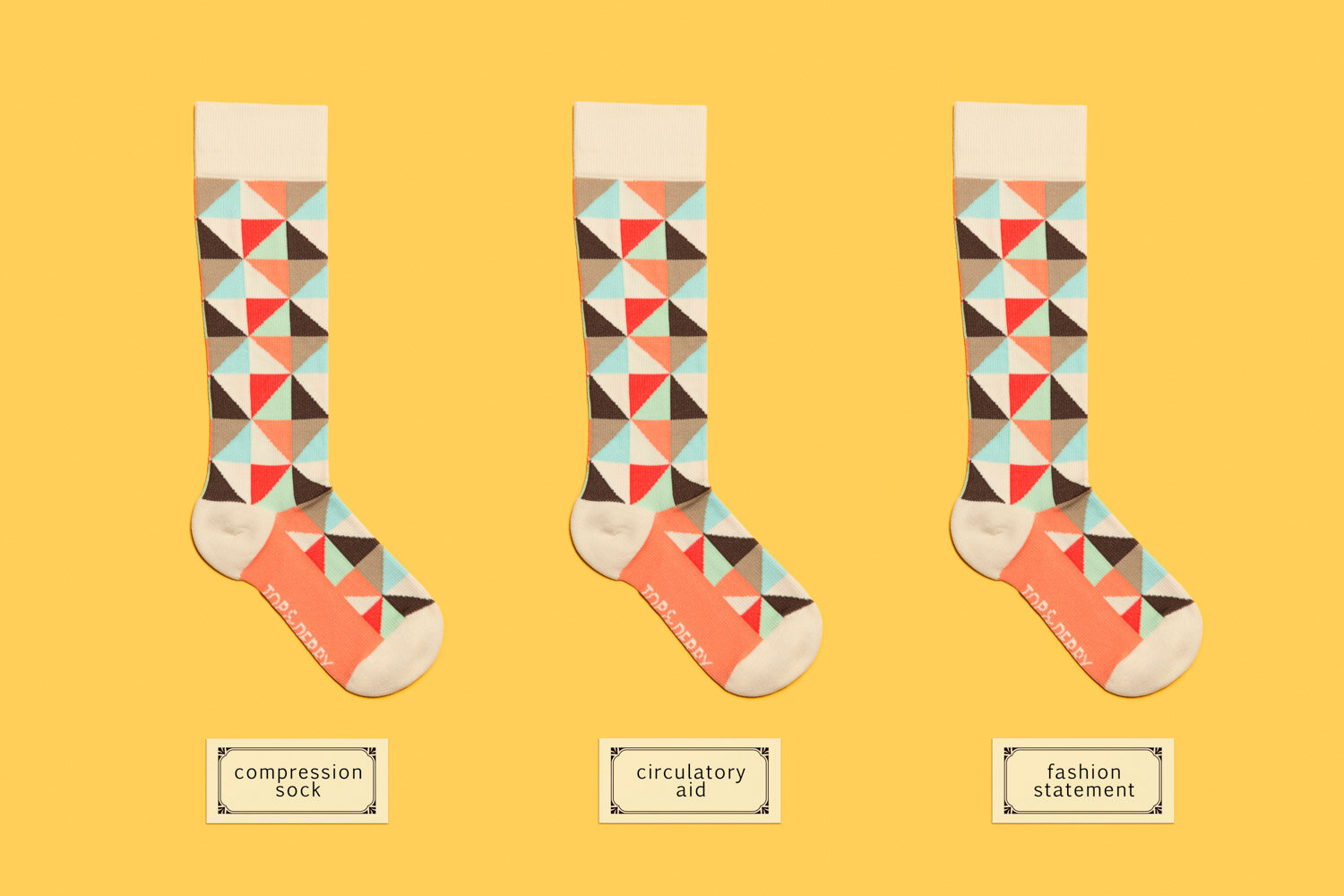 colorful product photography: compression socks with labels describing them as both assistive clothing and a fashion statement.