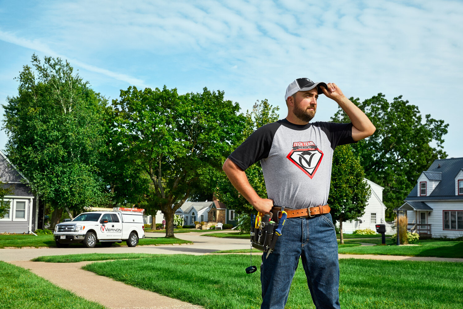 commercial portrait of network technician heroically posed in Viroqua, WI neighborhood