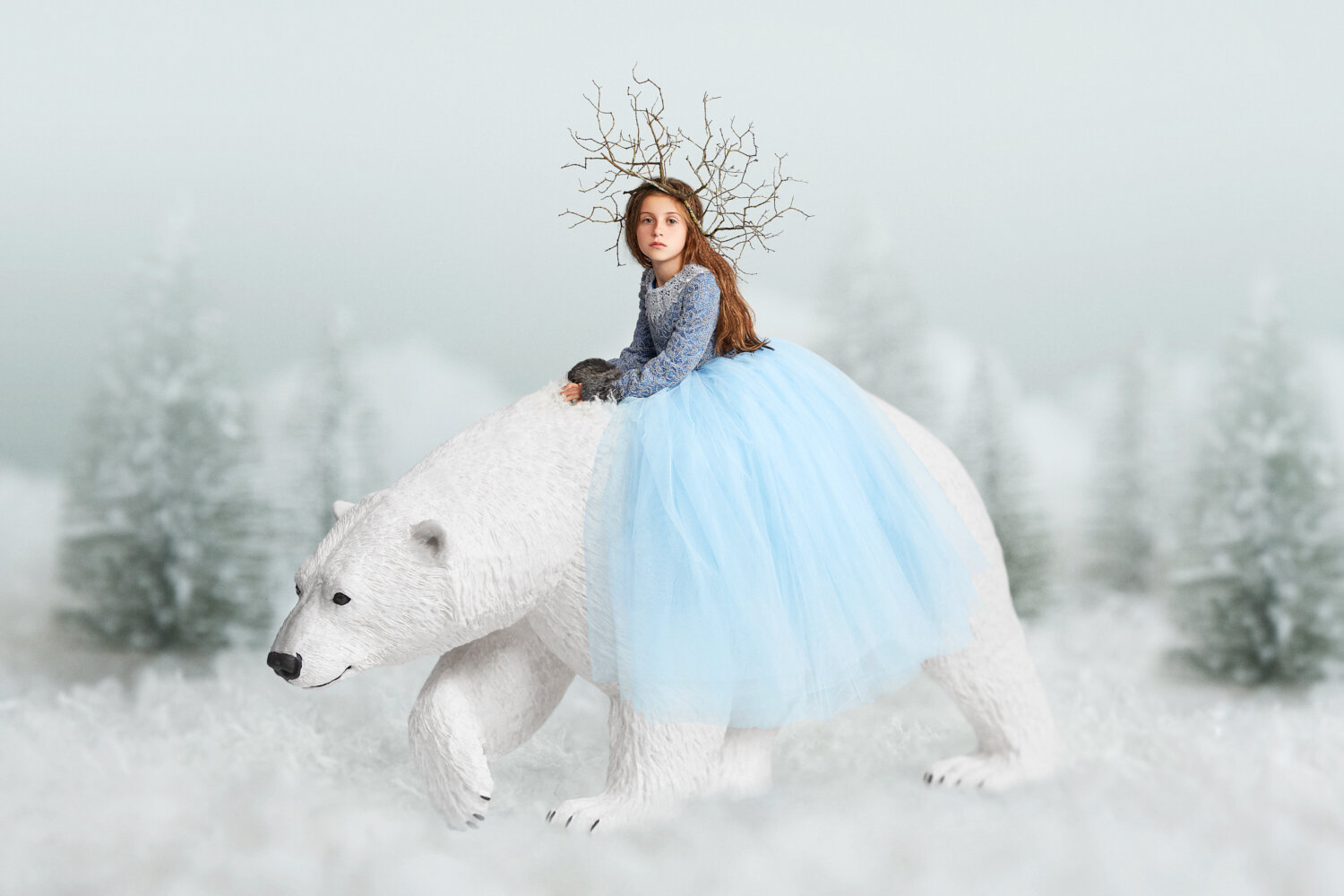 conceptual portrait of little girl with twig crown, beaded dress riding a polar bear in a winter forrest by portrait photographer Hanna Agar