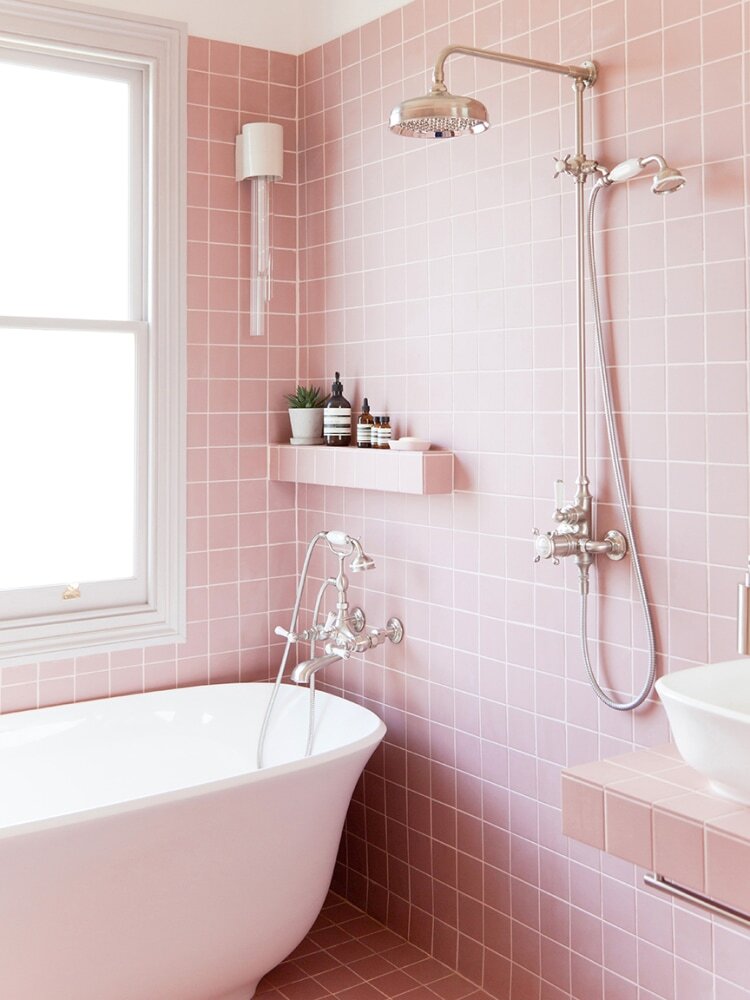 Domino | These Aren’t Your Typical 1950s Pink-Tiled Bathrooms