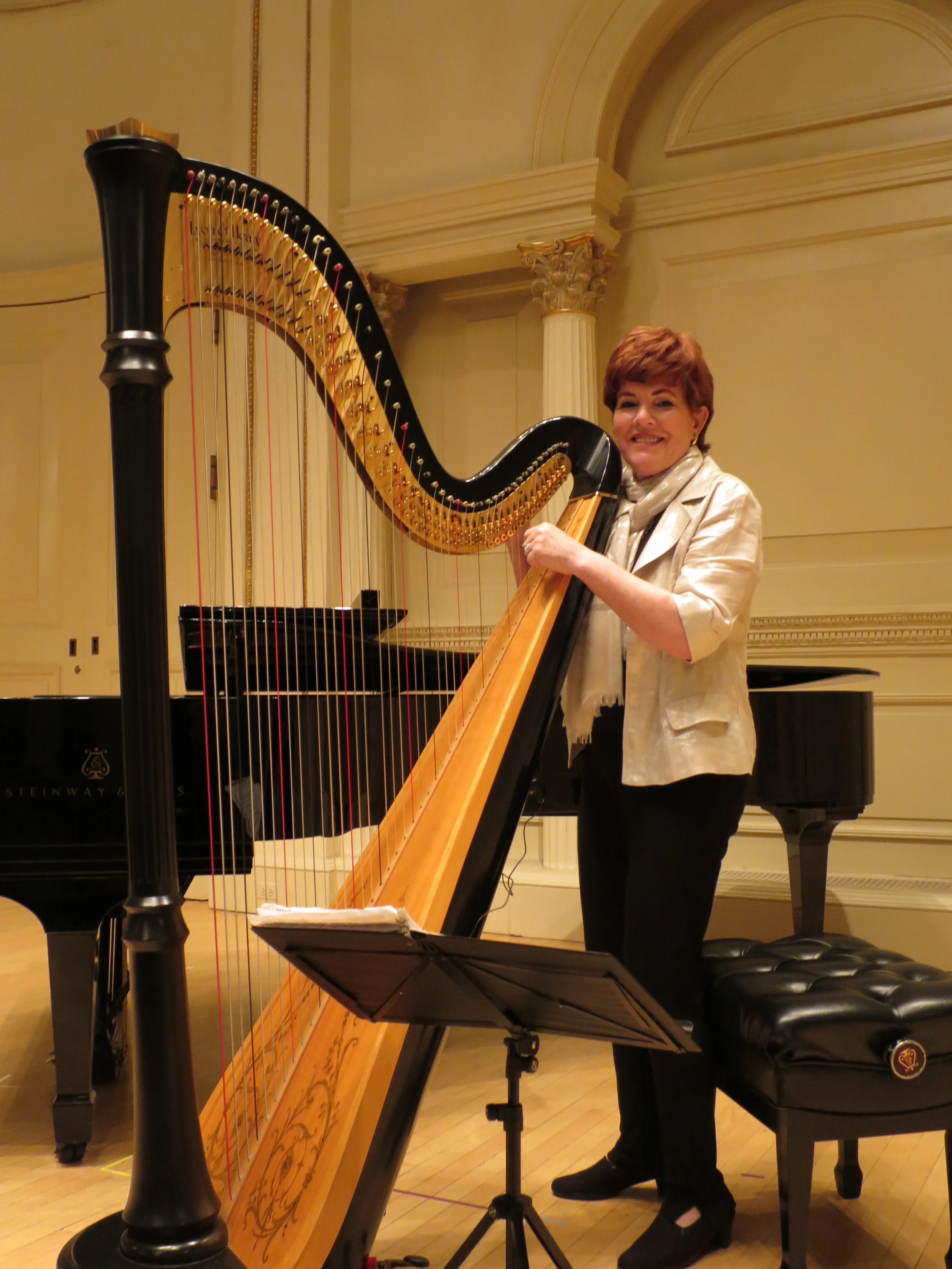 As producer and performed, Grace was busy. Meg offered to tune her harp before the performance and during intermission.