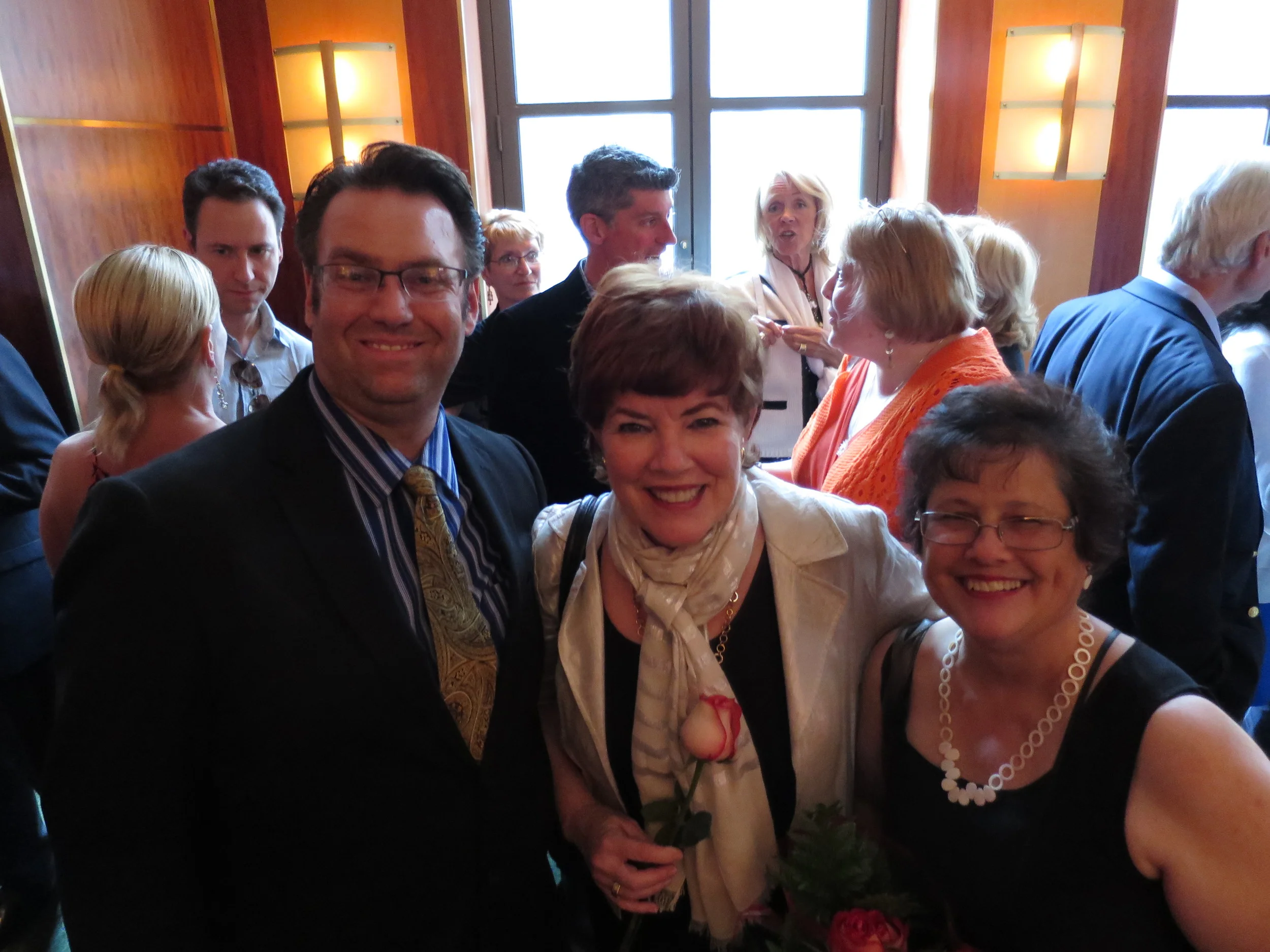 The concert was underwritten by the El Paso Society for Musicians of the Future. Its Vice President, Stephen Jackson and President Lynn Provenzano flank Meg on either side.
