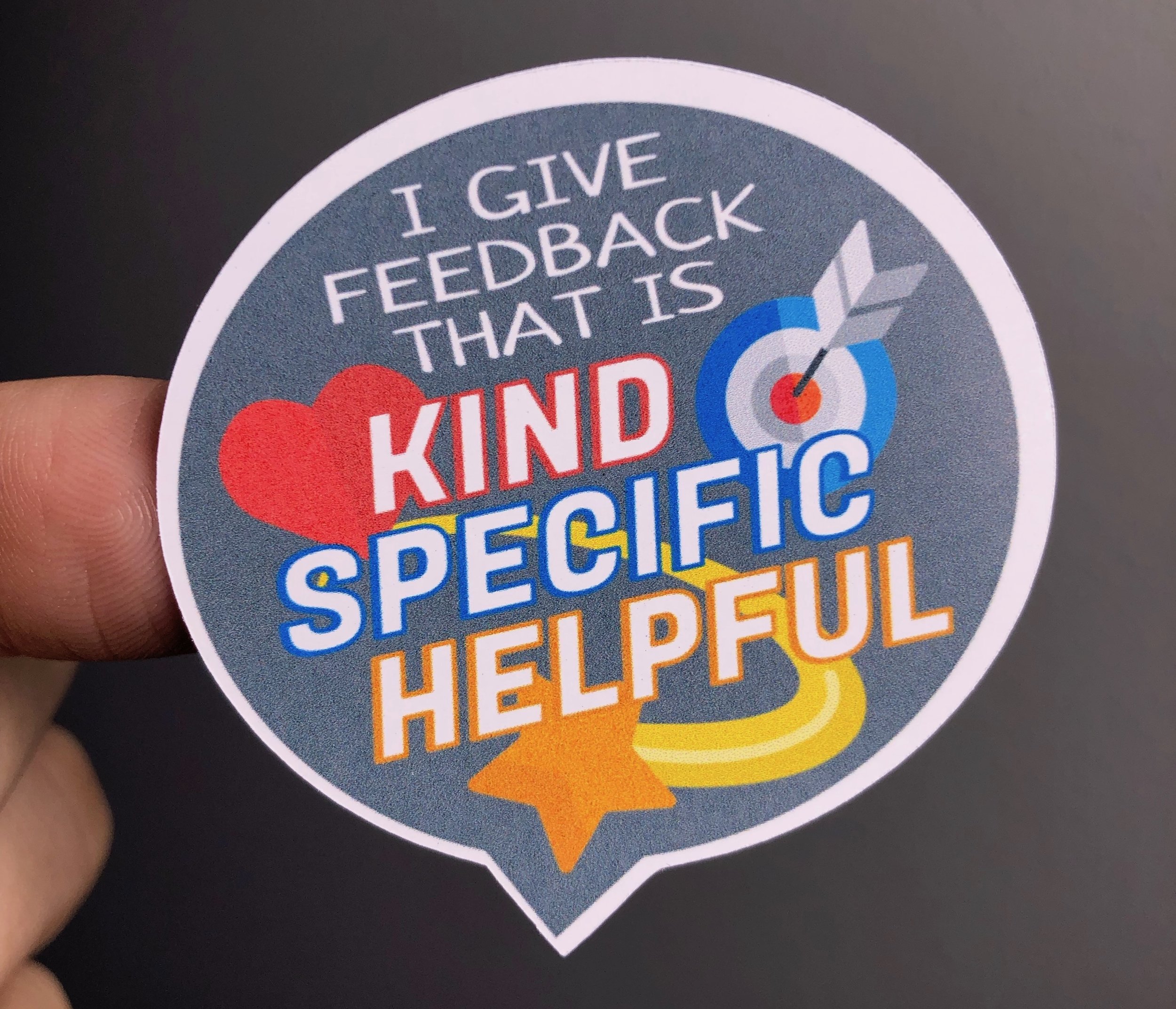 Photo of sticker: I give feedback that is kind, specific, and helpful