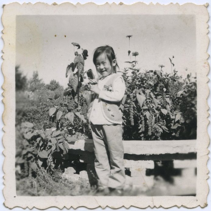 A single photograph from my childhood in Wu Lian — the beginning of memory.