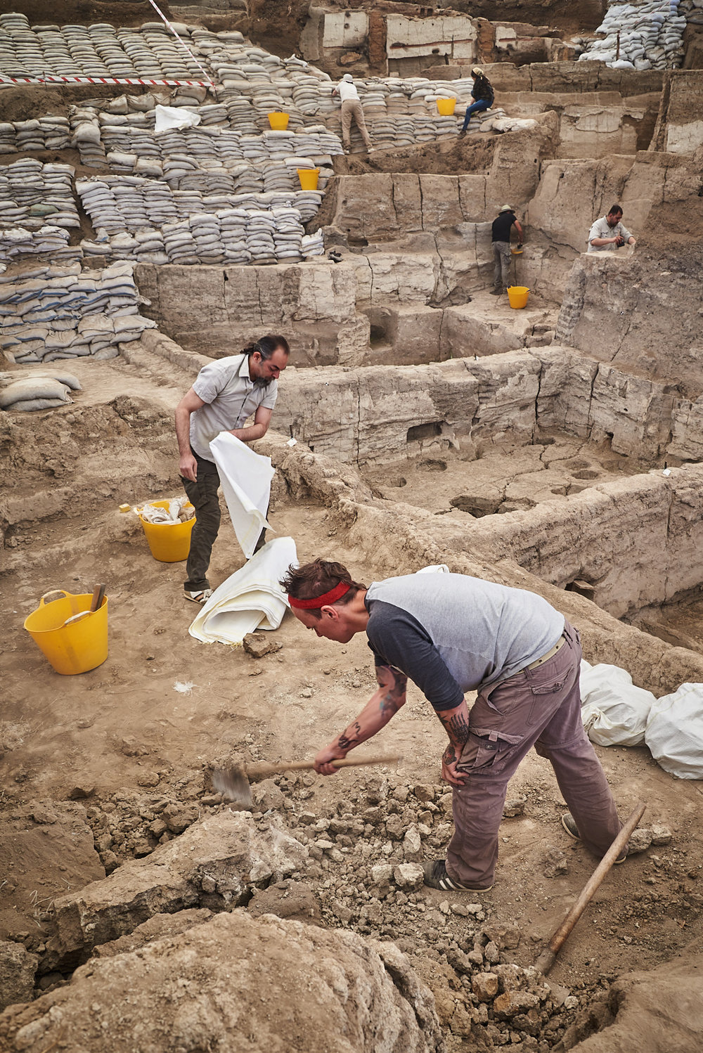  Thaer and Jerrod remove mudbrick wall collapse in the South excavation area. 
