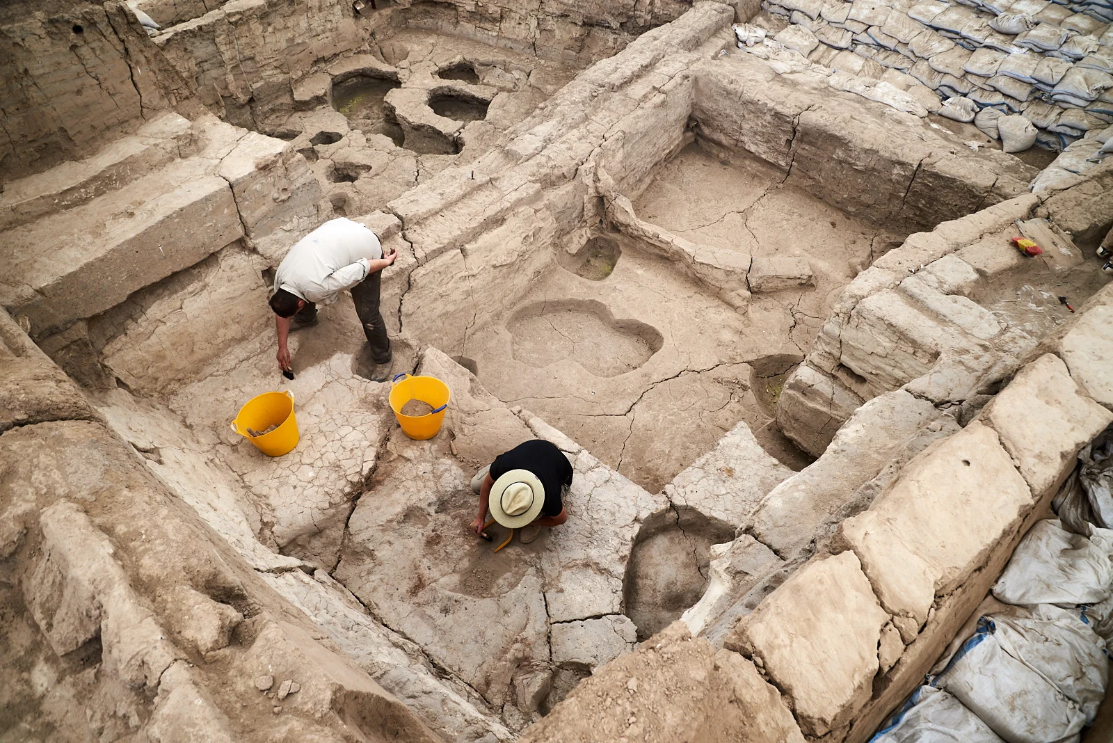 Onur and Numan clean Building 160 to start the 2017 excavation season.