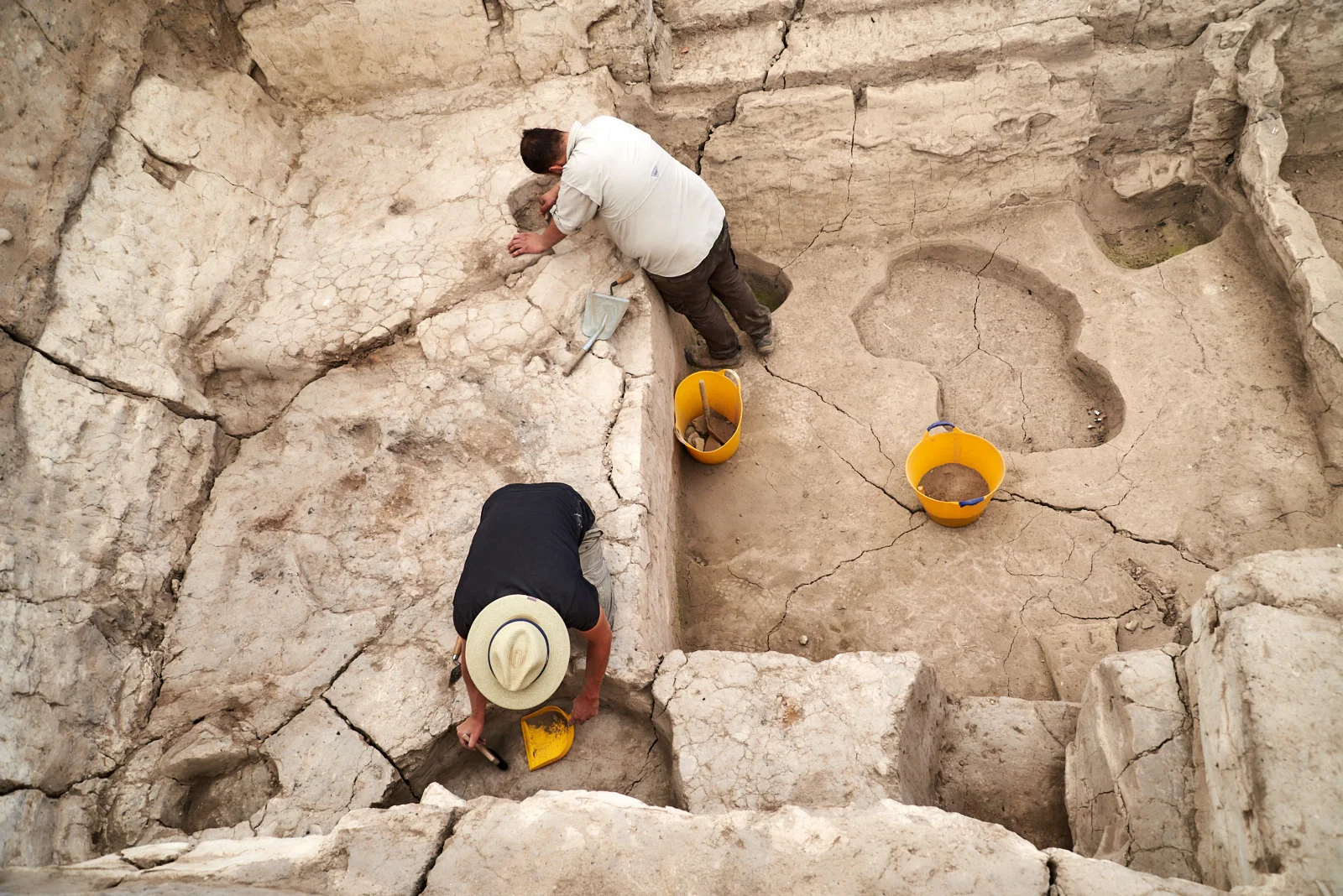 Onur and Numan clean Building 160 to start the 2017 excavation season.