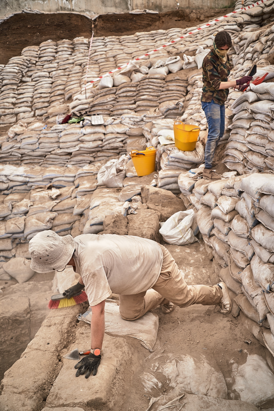  Cristina and Nada clean the South excavation area at the beginning of the 2017 season. 