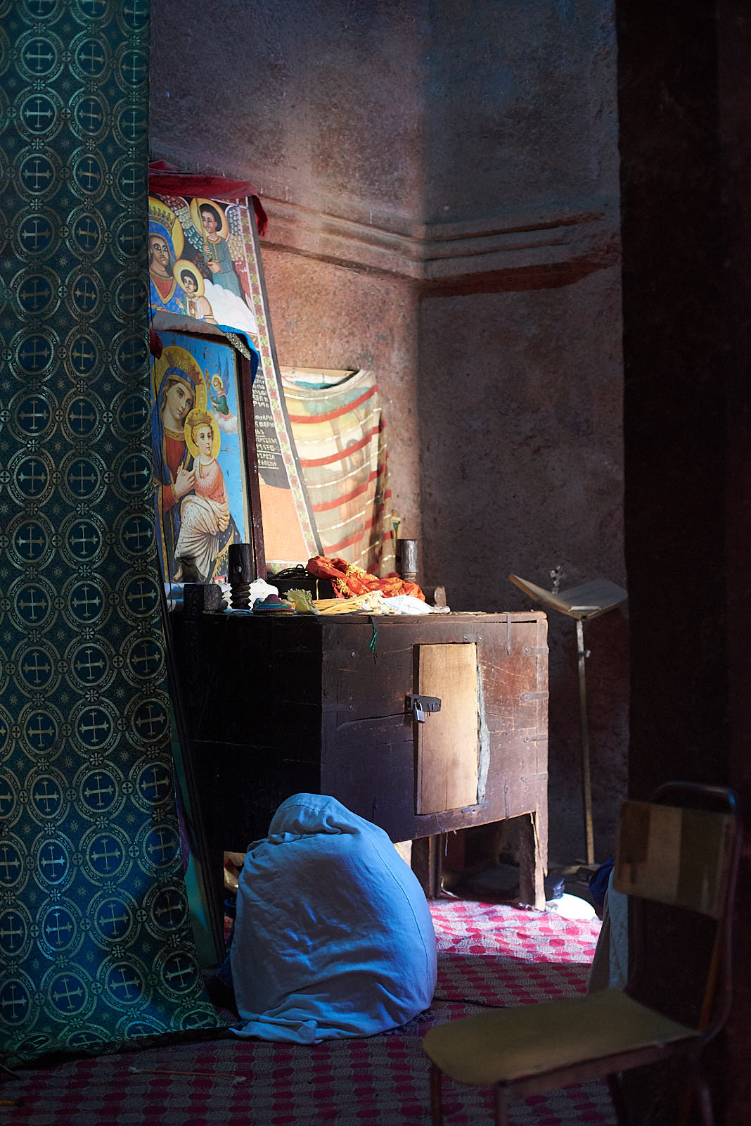  Ethiopian Orthodox pilgrim worshiping inside the Church of Saint George, Lalibela, Ethiopia. 