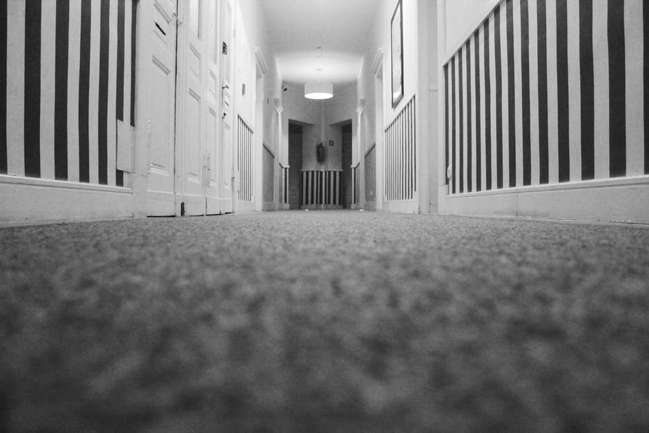A lot of people tend to get caught up in selecting the material to use for flooring in their home and might neglect one of the more important decisions in this process: the color. This is understandable if they are using residential carpeting or laminate flooring , since there are an almost infinite amount of color and style options available. Traditional hardwood flooring is a bit more limited. With these things in mind, here is a little guide to help you get started. Light Shades Look Great on Residential Carpeting You might be tempted to avoid lighter colors due to their propensity for staining, but they are one of the best options available, especially if you are concerned about space. Lighter colors tend to make smaller spaces look much larger. If you want your bedroom to look a little bigger than it is without sacrificing space elsewhere, one option is to use a lighter shade of carpet. This includes whites and lighter shades of colors, like a pastel blue or a light cream color. While you certainly are able to go with something a little darker due to the fact that carpet is more dense and sits higher than pretty much all other flooring materials, it will make the room look exponentially smaller. This might be great for very large rooms, or if you are using commercial carpeting , but it will only shrink the rooms in your home. Neutral Tones Are Perfect for the Kitchen If you’re looking for a good tone to use in the kitchen but aren’t sure what will look good, gray is a wonderful tone. For one thing, it doesn’t really impact the way you perceive the size of the room. For another thing, grey is dark enough that it won’t show any stains from food as prominently as a lighter shade would. A dark kitchen floor will just look strange. Neutral colored flooring is also a good fit for an office since it won’t reflect the light from the harsh fluorescent overhead lighting in many offices, which can be harmful to the eyes. Traditional Hardwood Flooring is Made to be Dark If you plan on installing traditional hardwood floors , you will have darker toned floors. Most finishes for hardwood flooring are darker in tone because it helps hide away a lot of the natural scuffing and scratches that are part and parcel of having hardwood floors. If these things do show up, they will show up as character in the wood, not as an eyesore. The color’s impact on size isn’t always a bad thing, either. It will help make a living room feel more cozy and inviting, or bring the family together around a fire. There will always be a place for the colors and shades you want to use in your home or office. The trick is to find the best place to utilize the components working in favor of those colors or against them. This can be tricky sometimes, which is why if you live in the Nashville and greater Middle Tennessee area, the professionals at Ozburn-Hessey are waiting to talk to you. Contact us today to learn how we can help you with all of your flooring needs.
