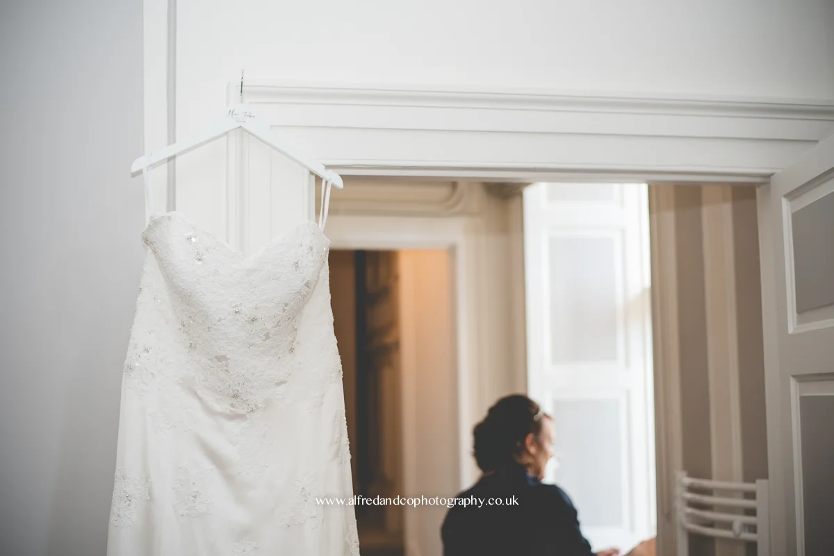 wedding dress hanging at derbyshire wedding venue