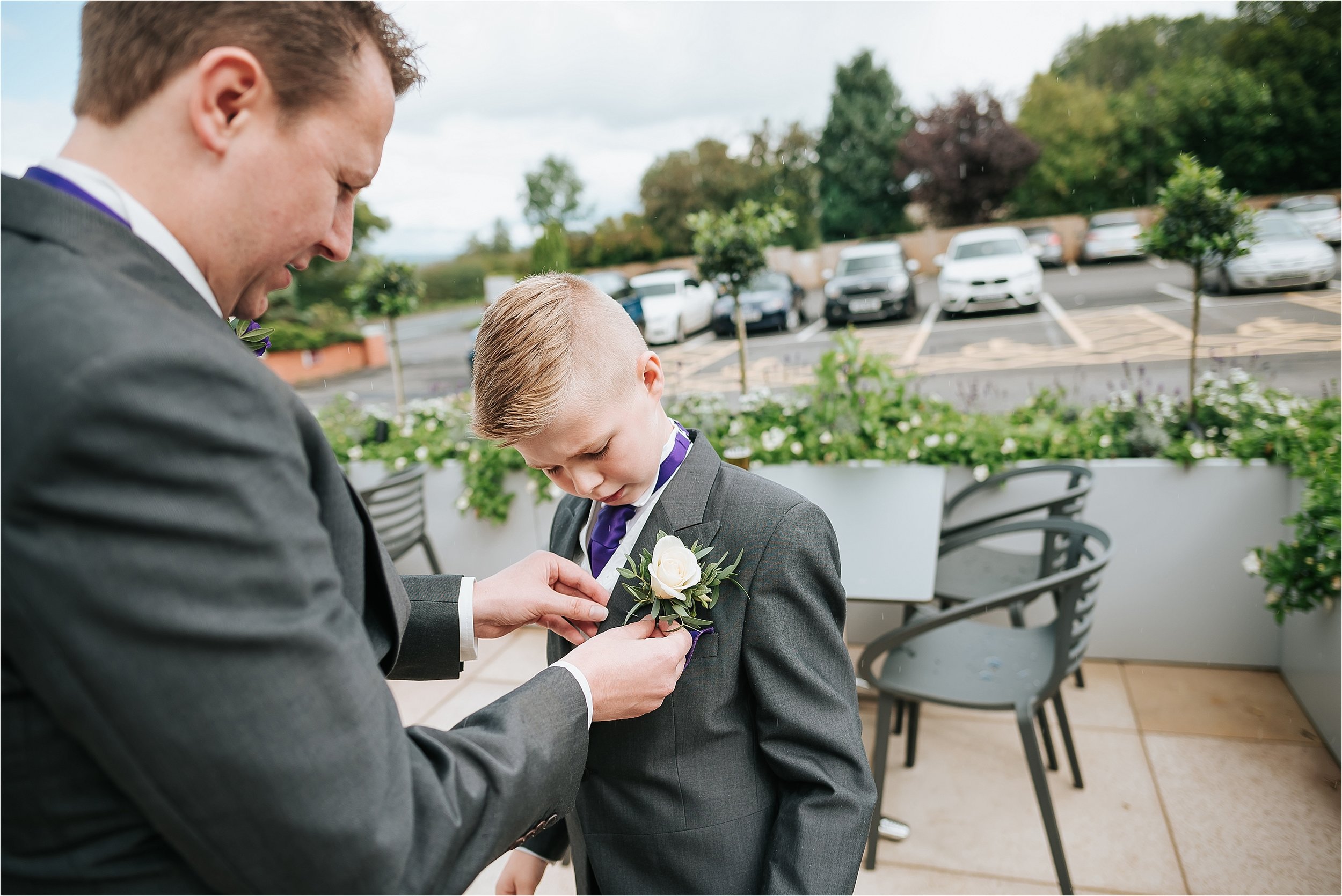 father and son at wedding