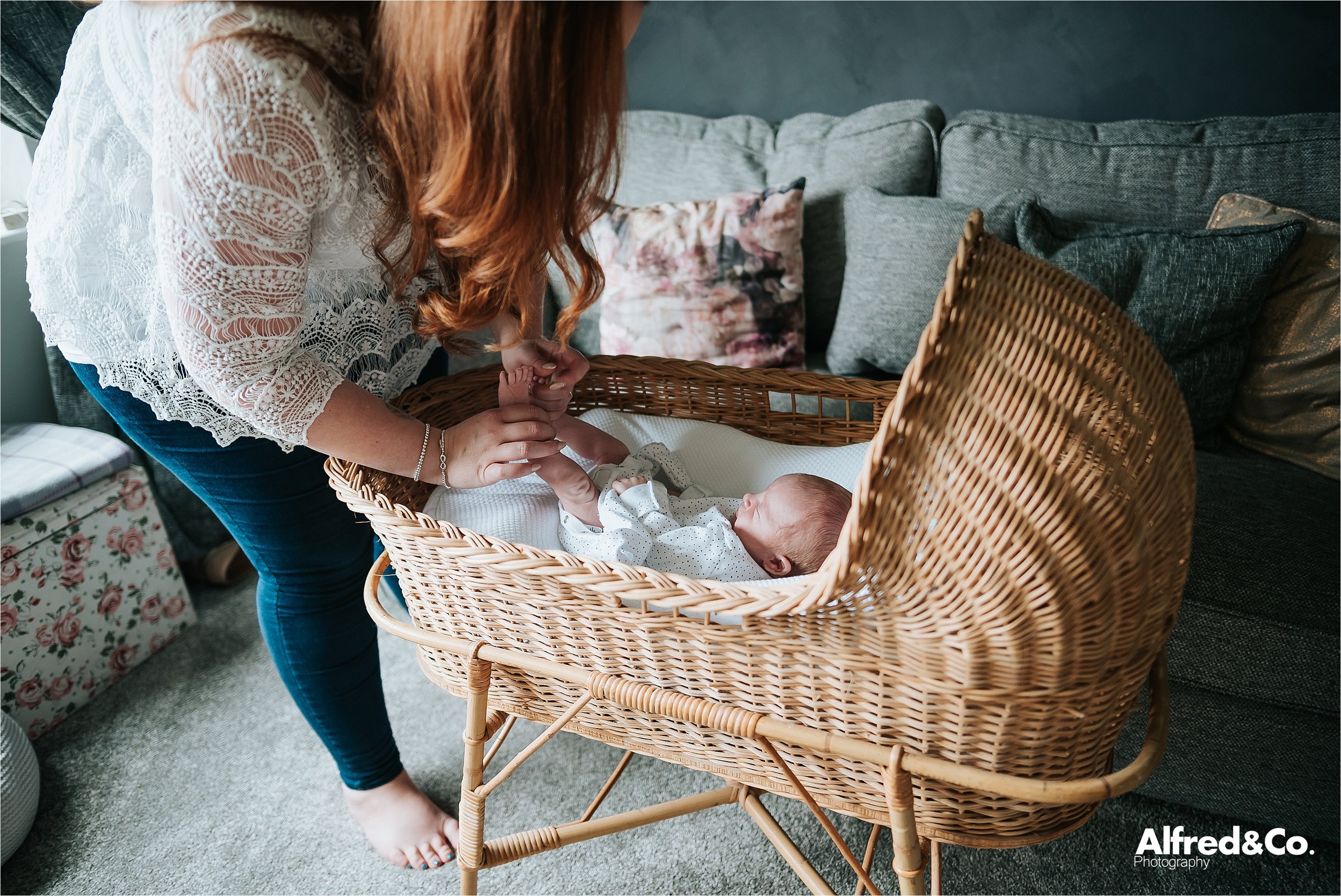 Mum changing baby boy