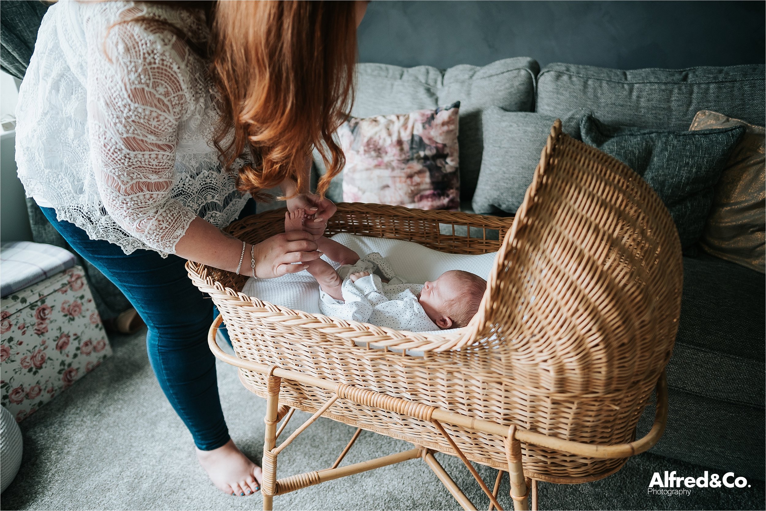 Mum changing baby boy 