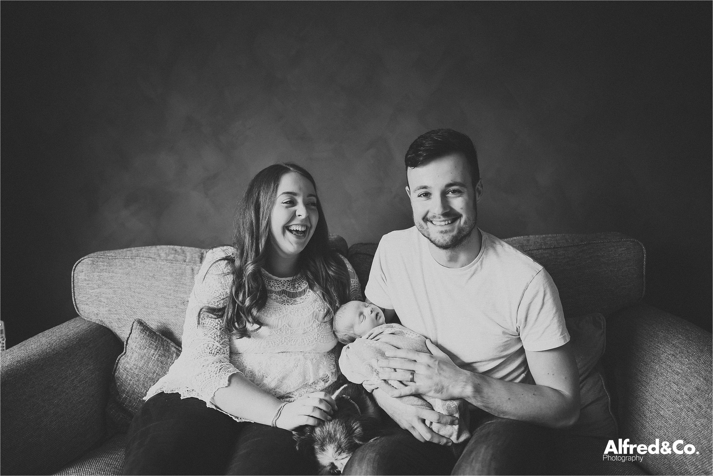 Family portrait with dog and baby 