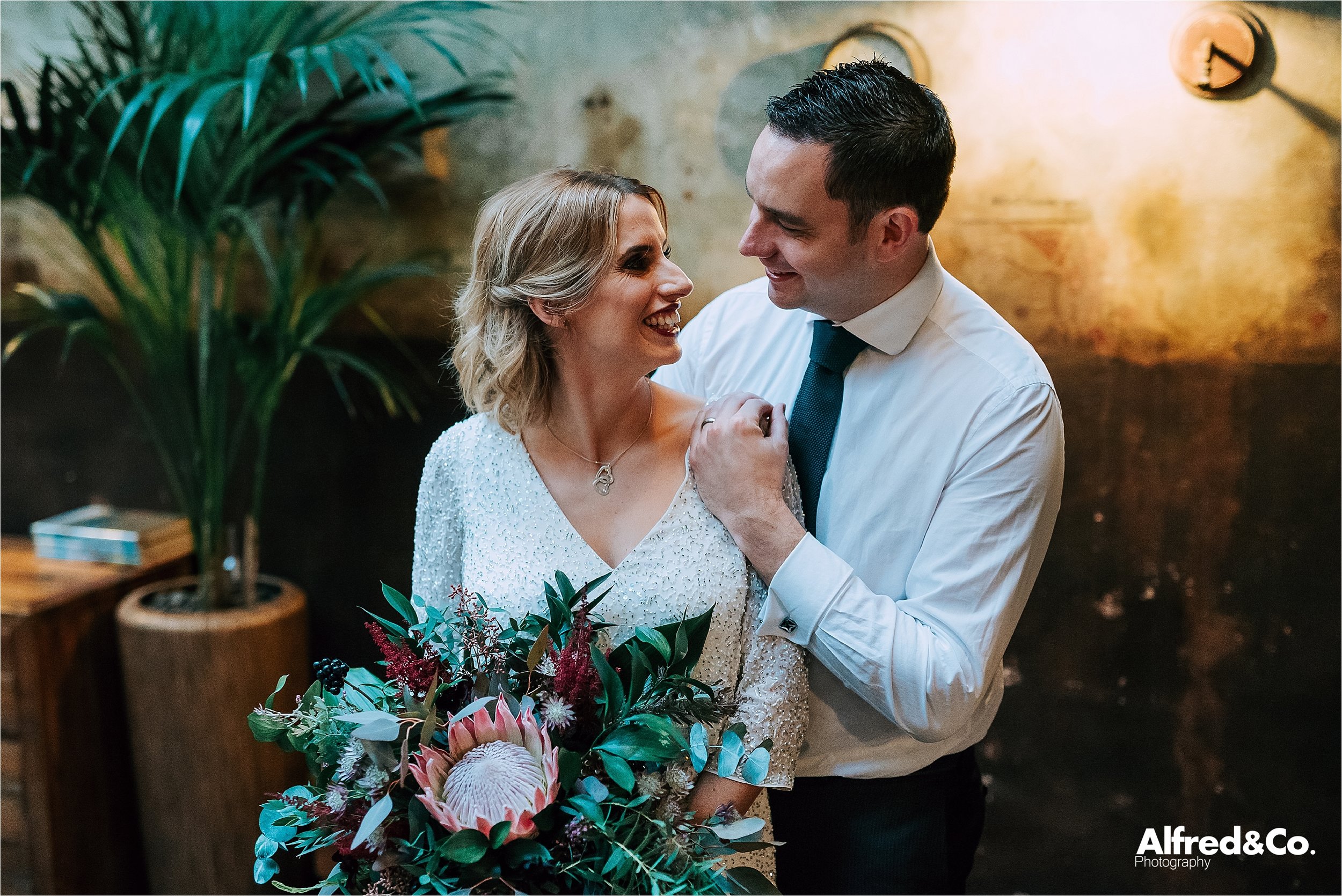 bride and groom in engine room 