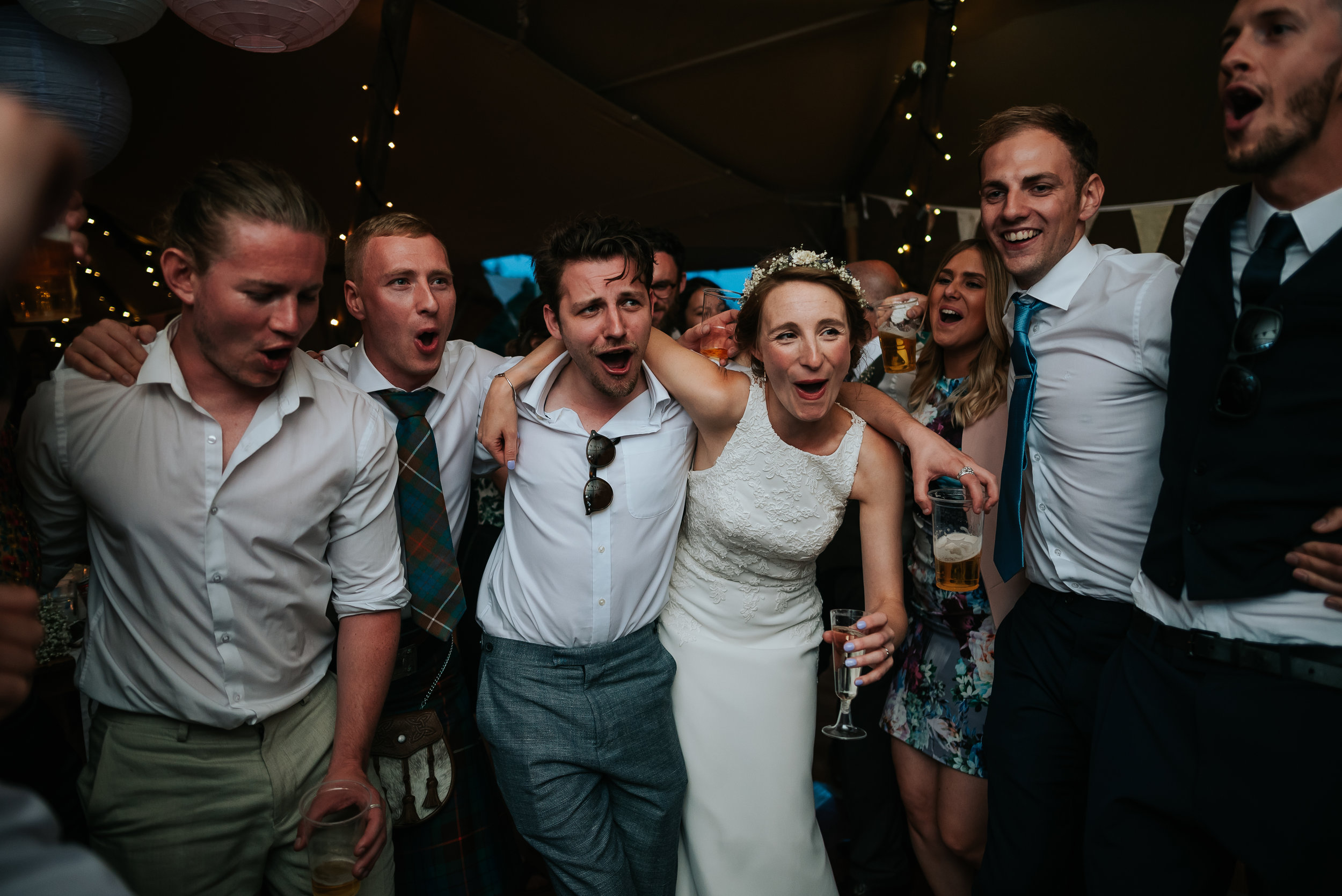 bride partying in a tipi 