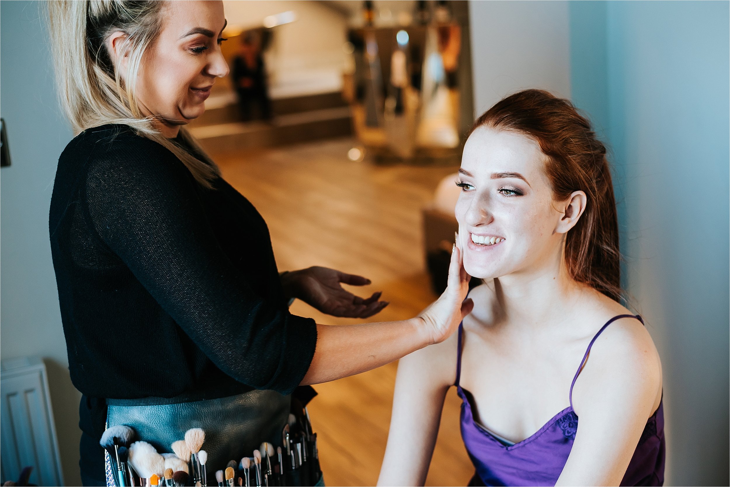 bridesmaid having make up done 