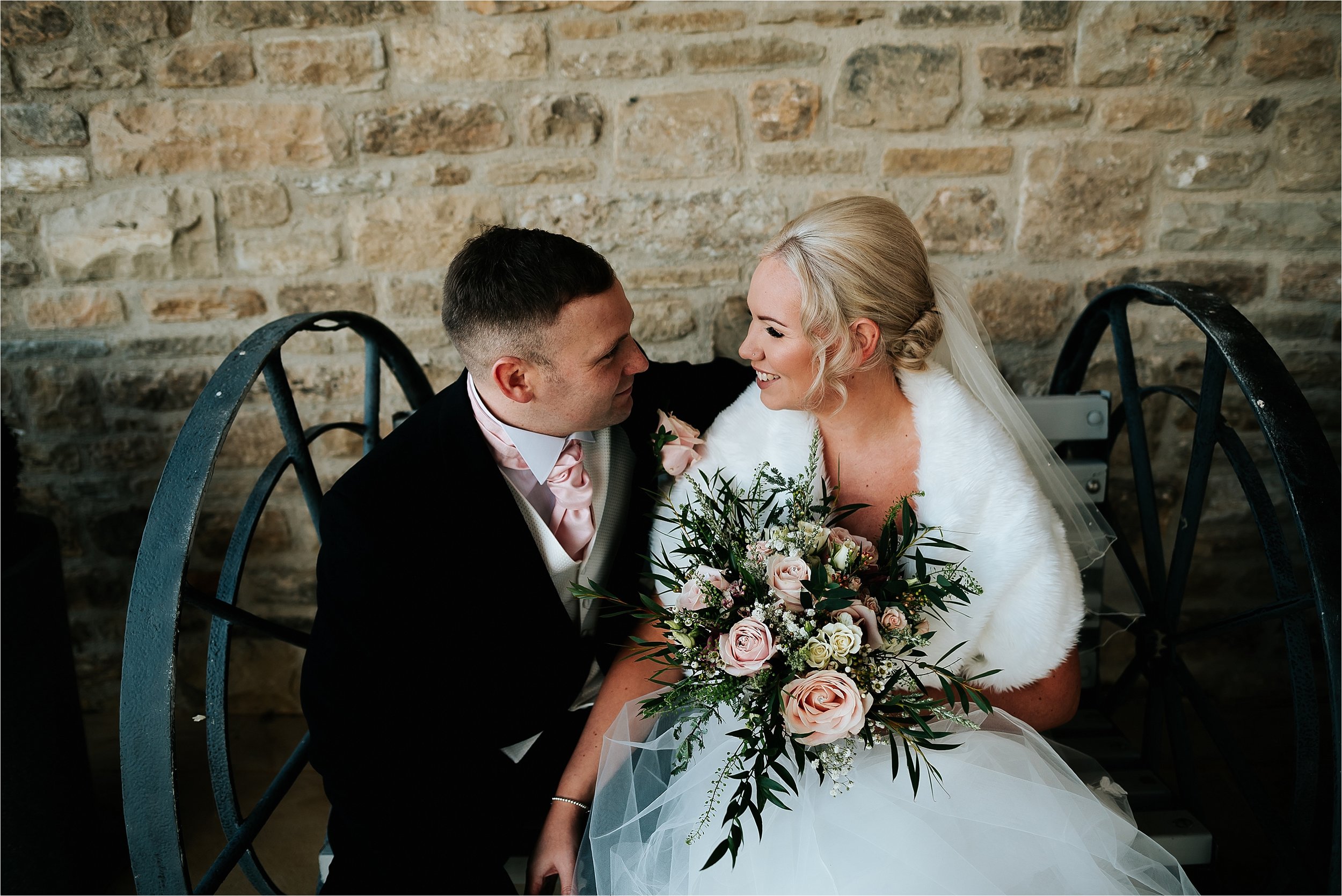 bride and groom embrace 