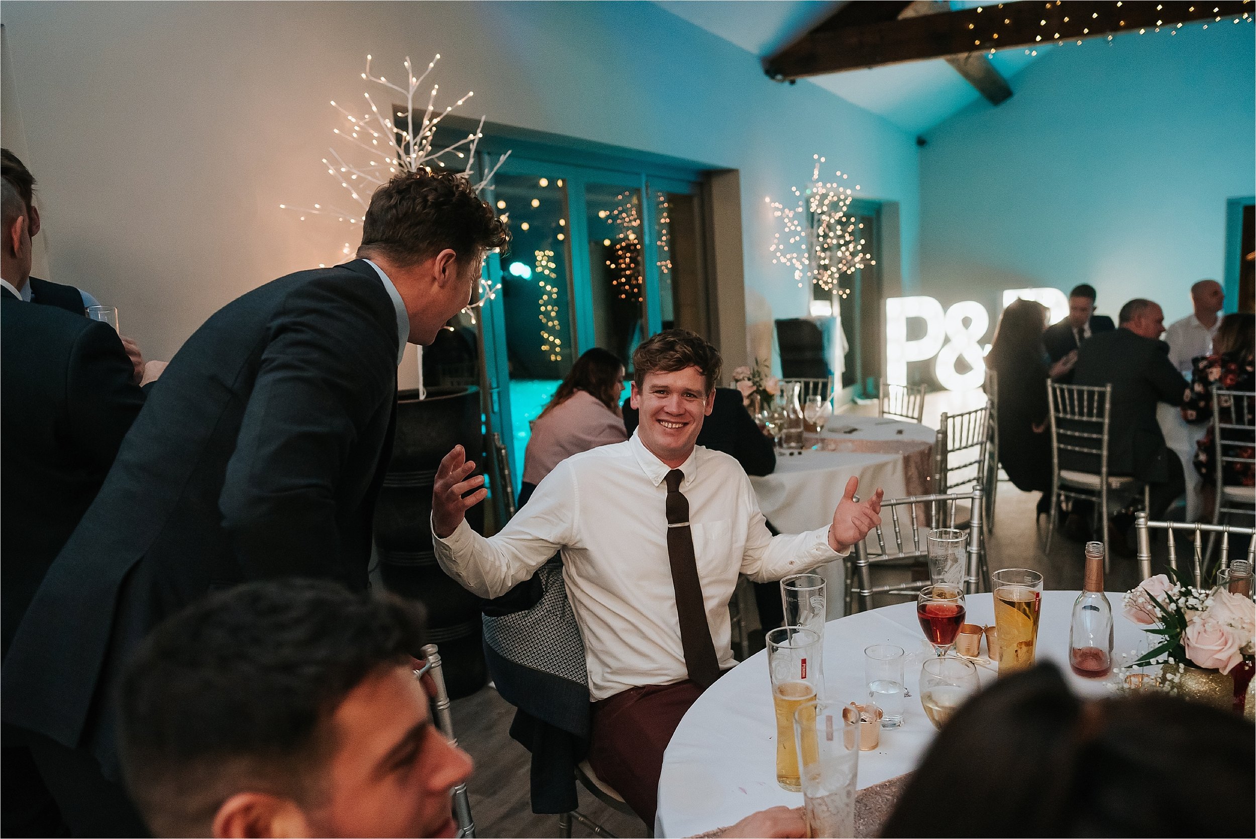 man laughing at winter wedding in yorkshire 