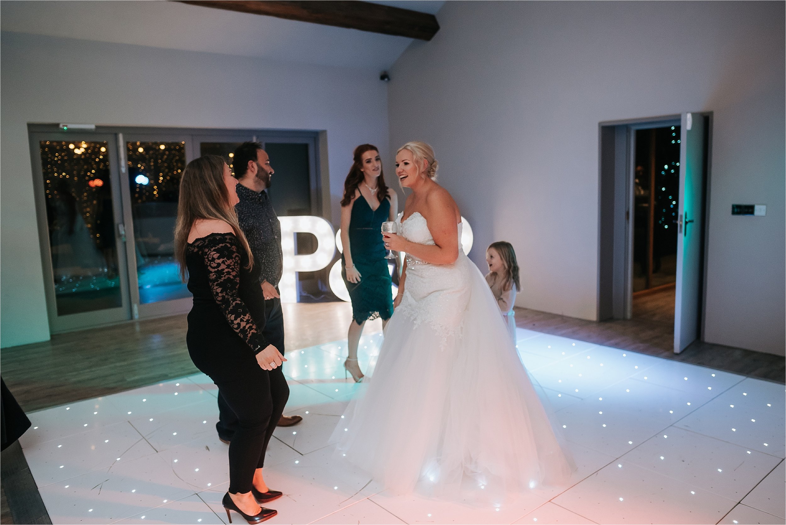 bride dancing on dance floor 