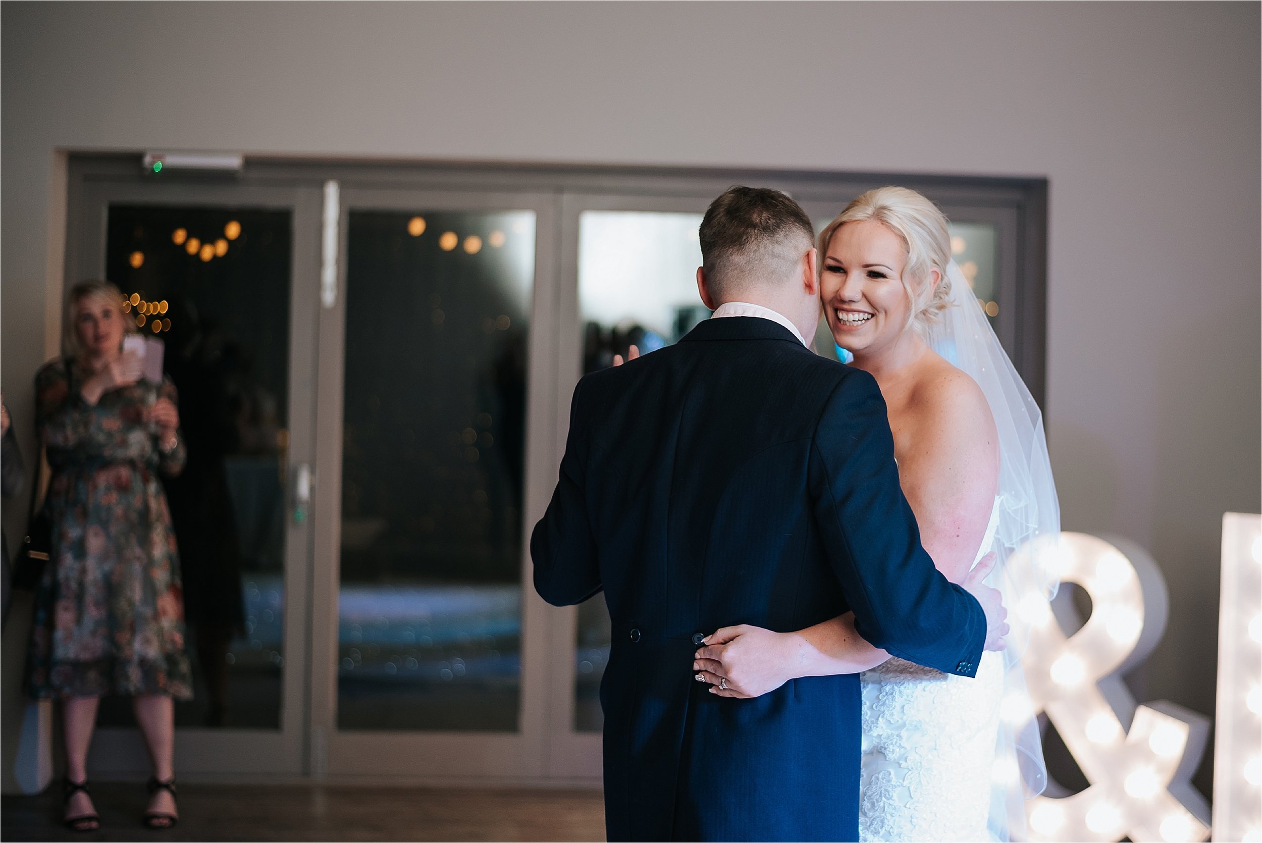 happy bride dancing at wedding