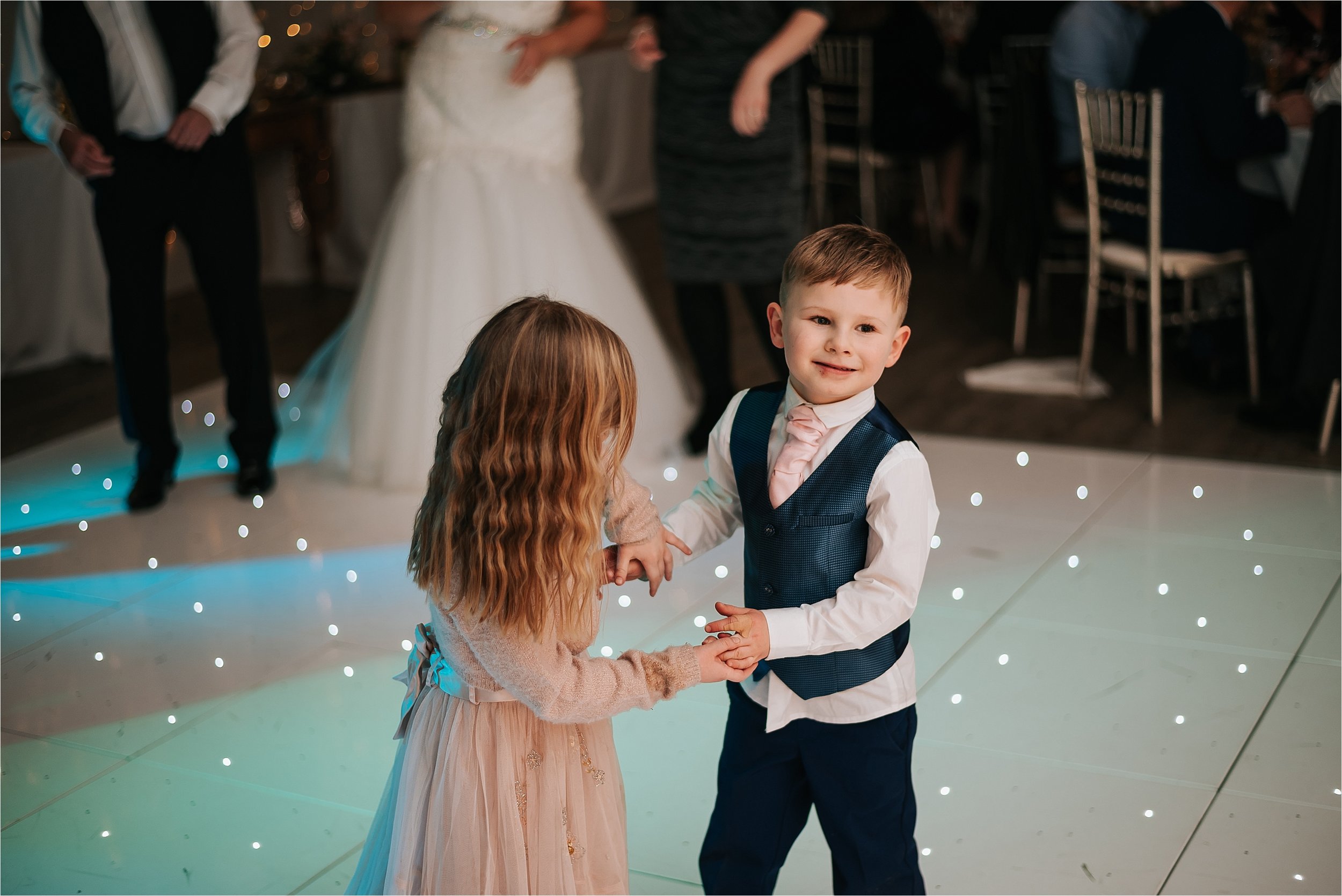 little boy and girl dancing 