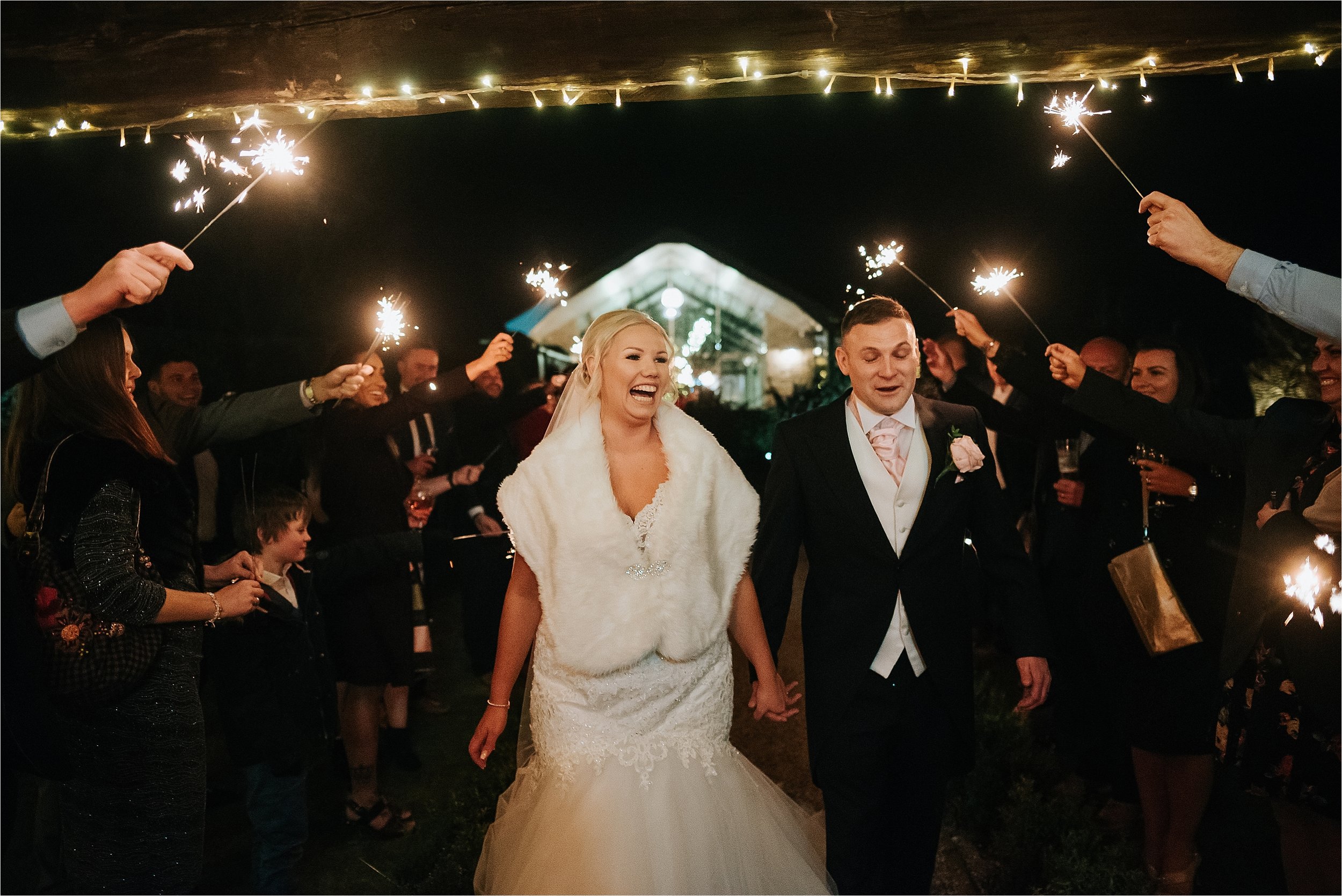 bride and groom and sparklers 