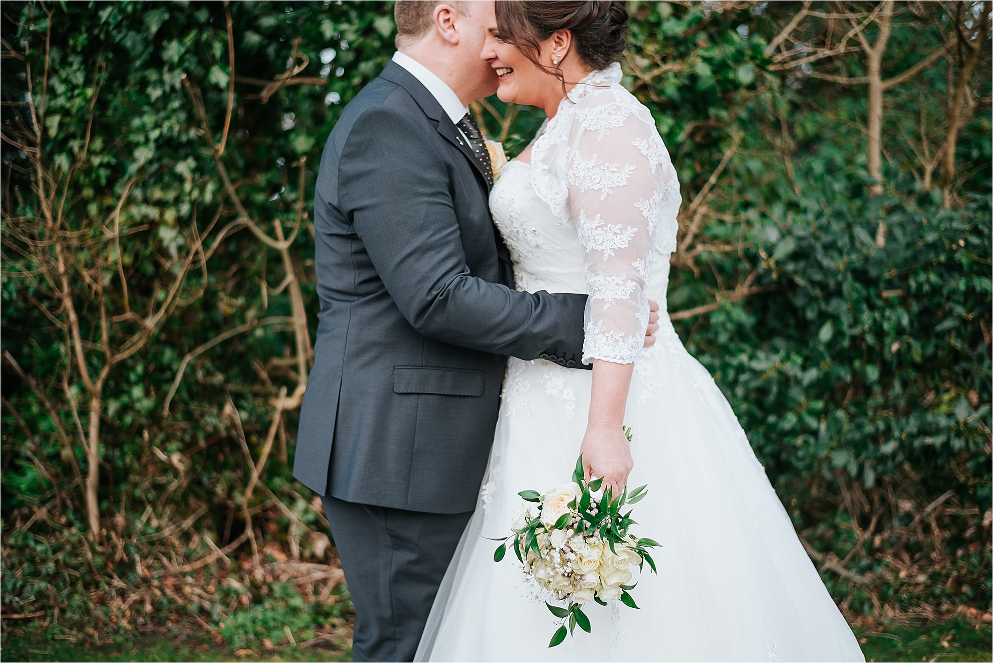 bride and groom smiling 