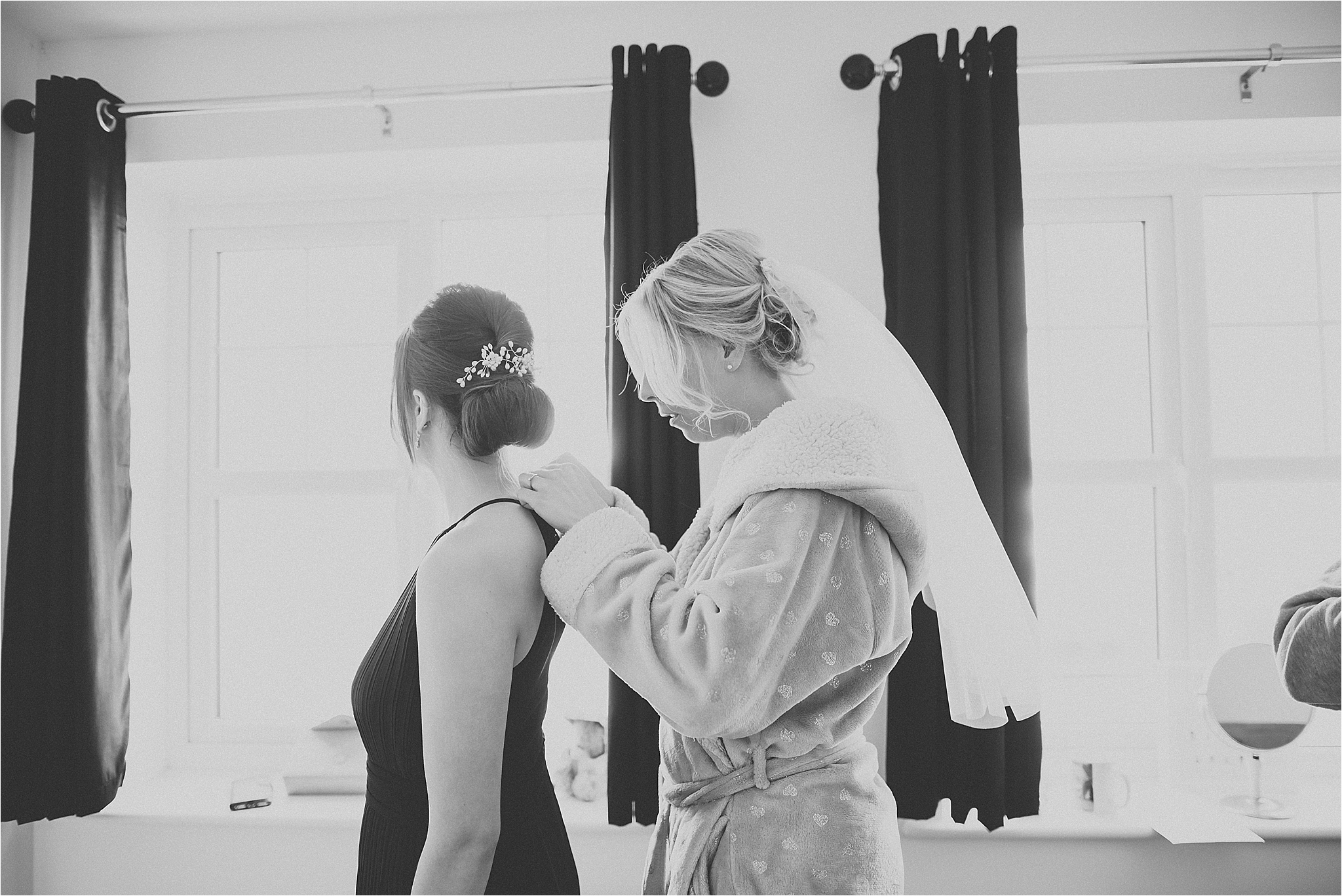 bride and bridesmaid get ready for wedding in garstang