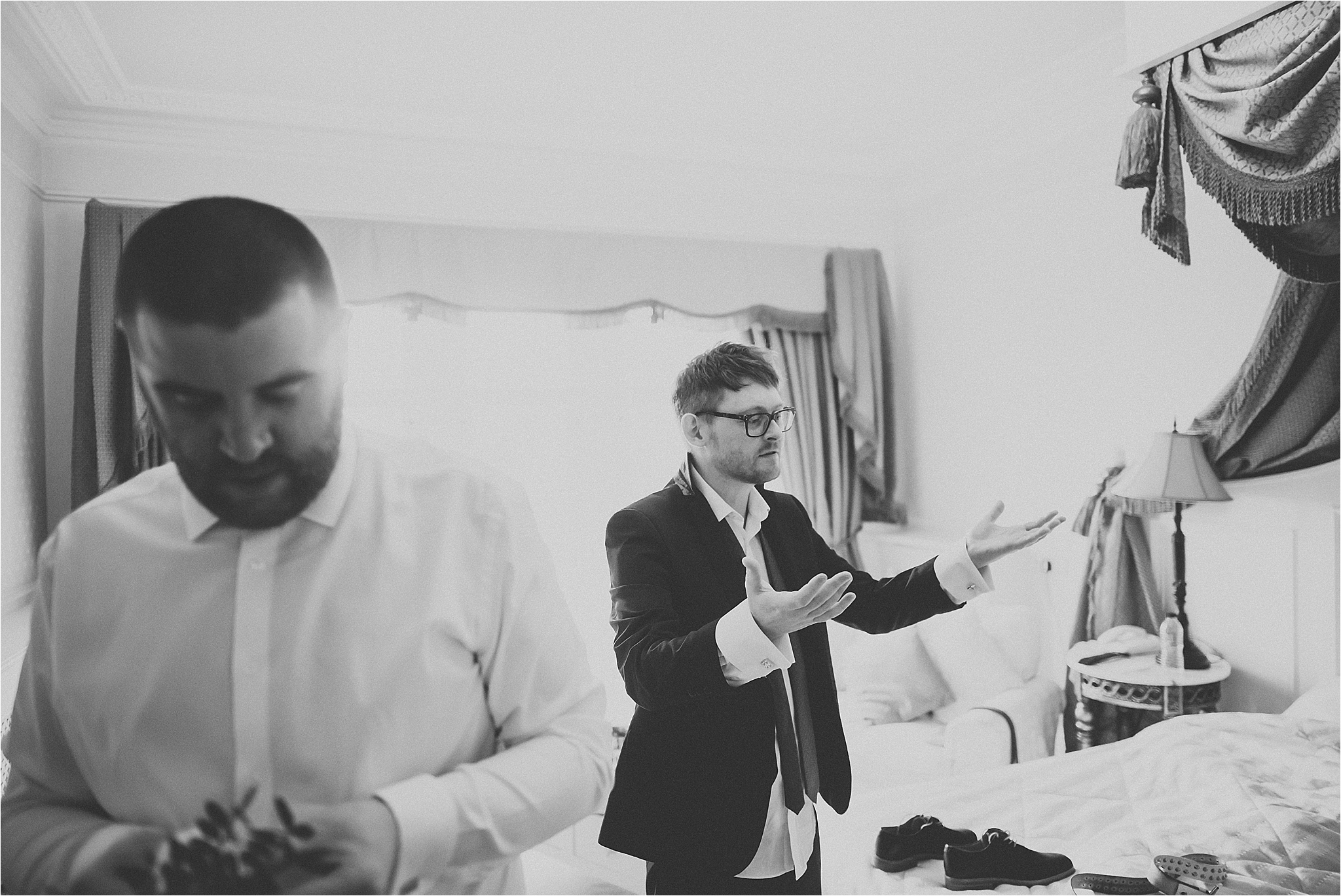 groom and groomsmen get ready for wedding