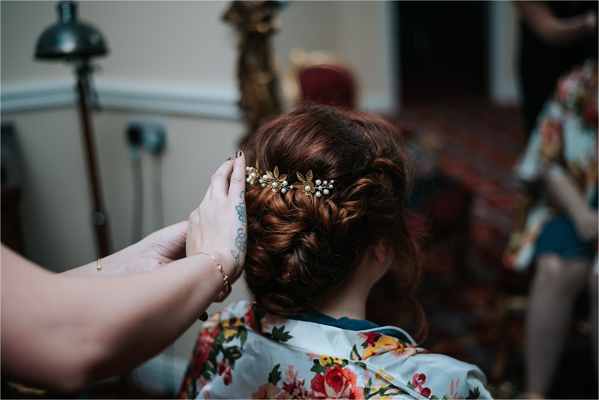 bride has hair done ready for wedding 