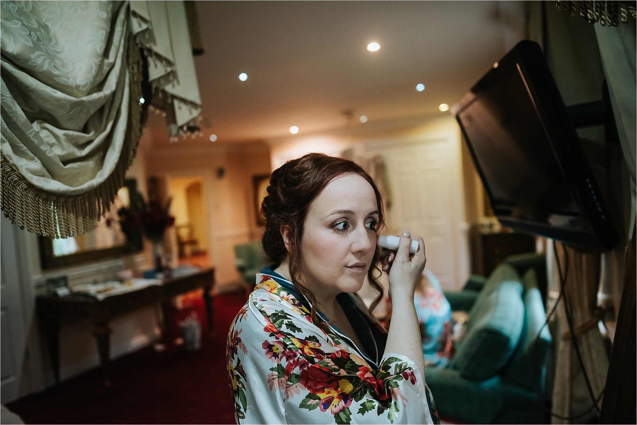 bride does make up at grange hotel wedding venue