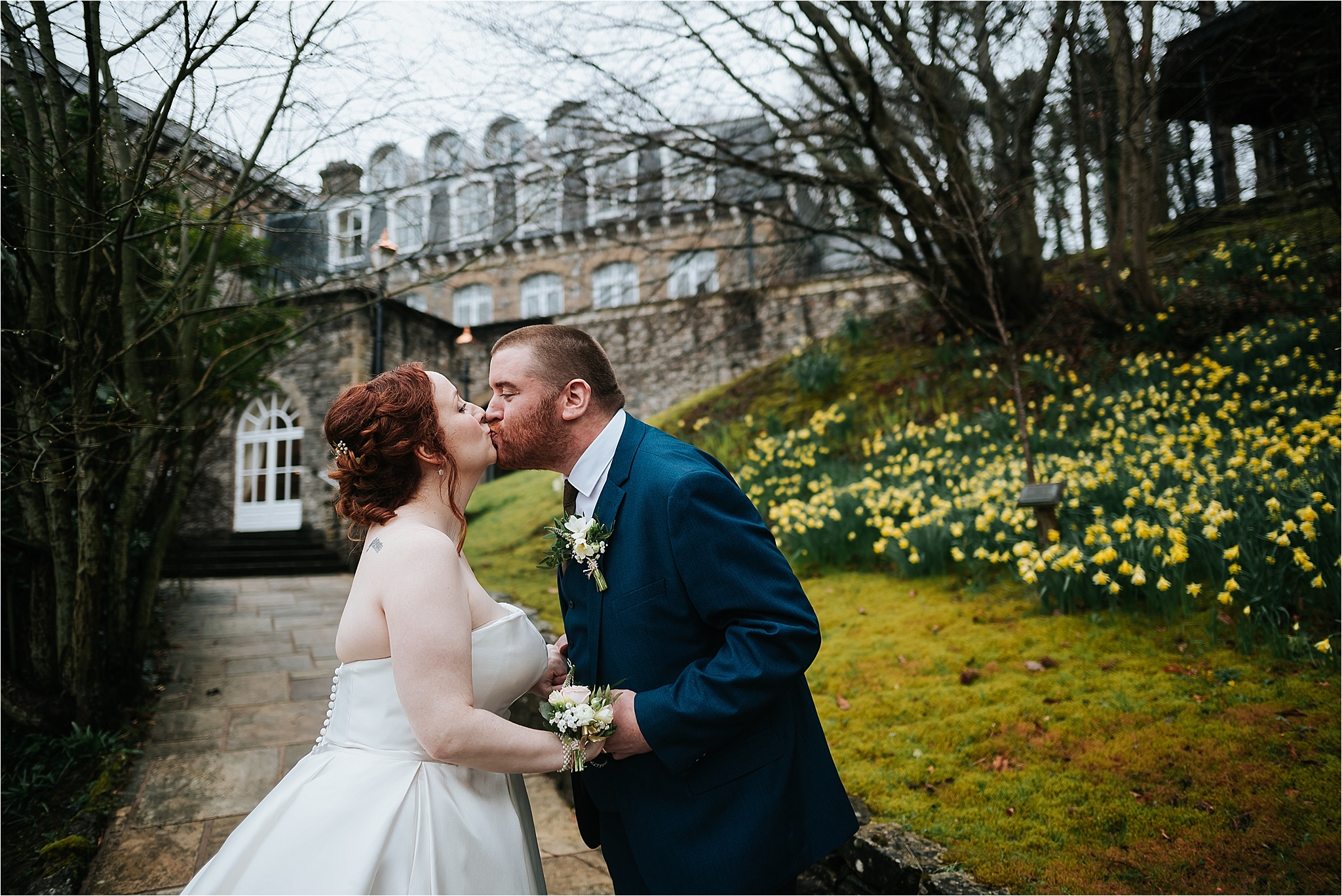 bride and groom kiss
