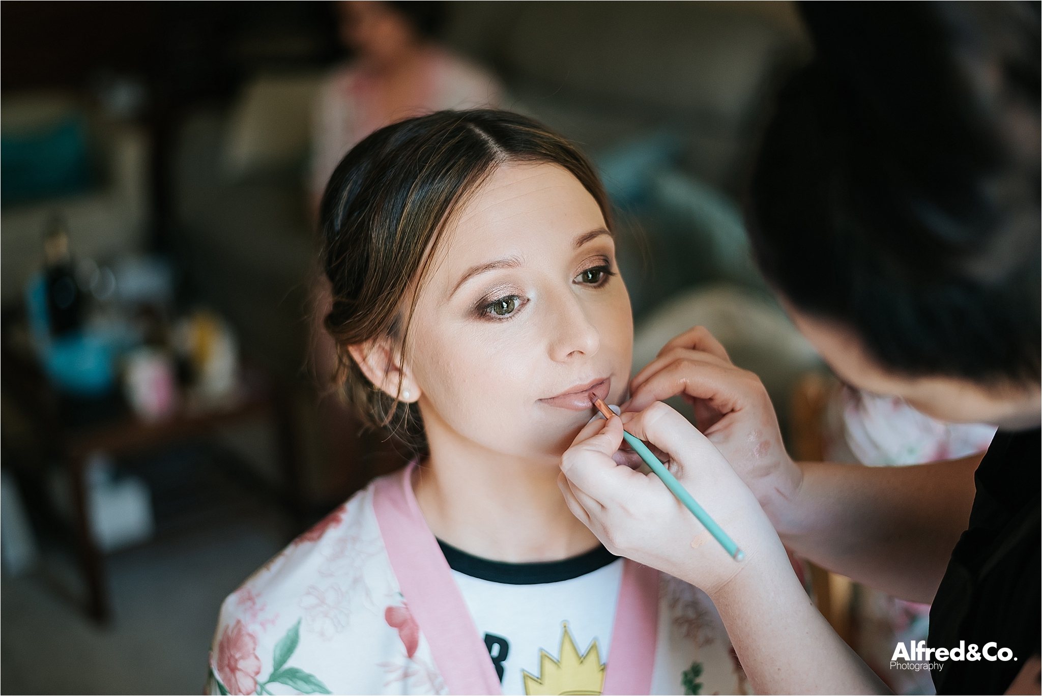 bridesmaid having make up done
