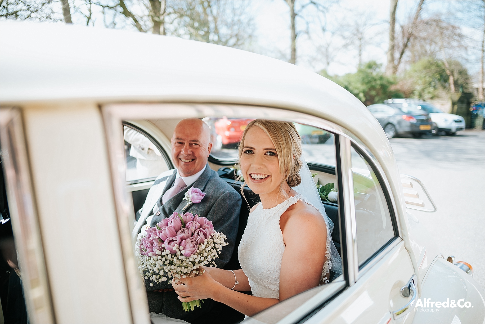 bride in wedding car 