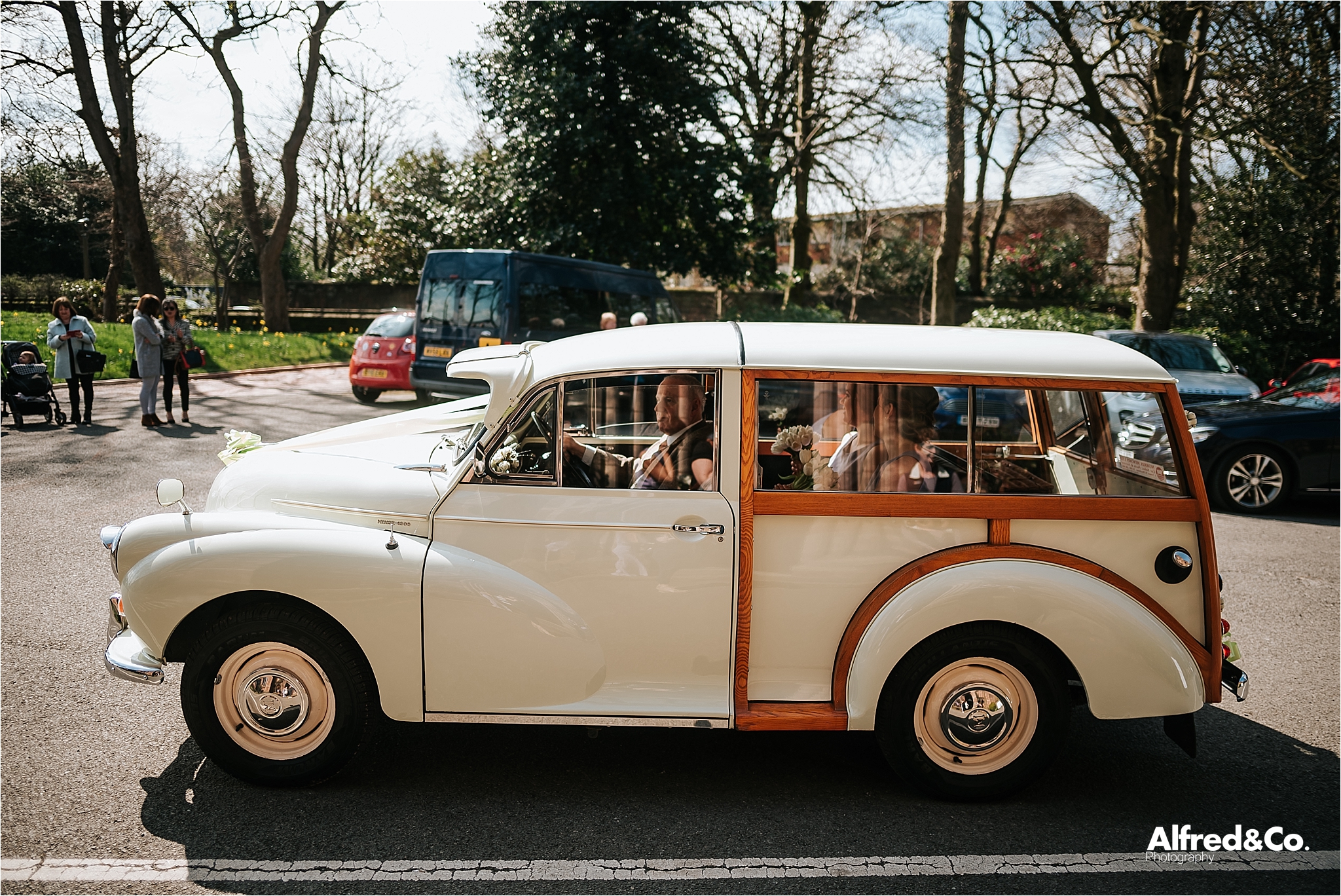 bride arrives in wedding car at mossley hill church liverpool