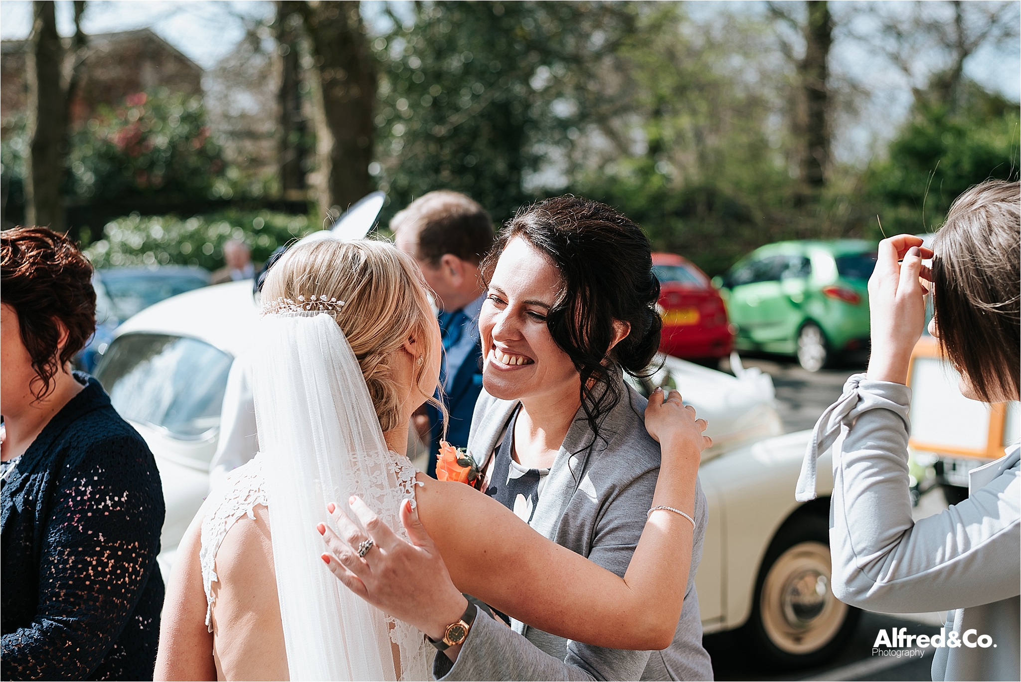 bride greets guests at wedding