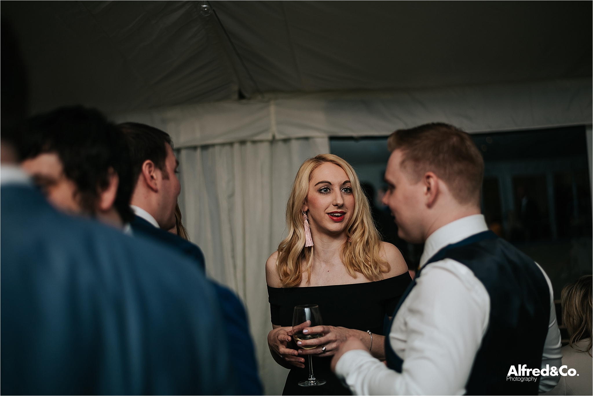 guests enjoying the evening reception at speke hall wedding pavilion