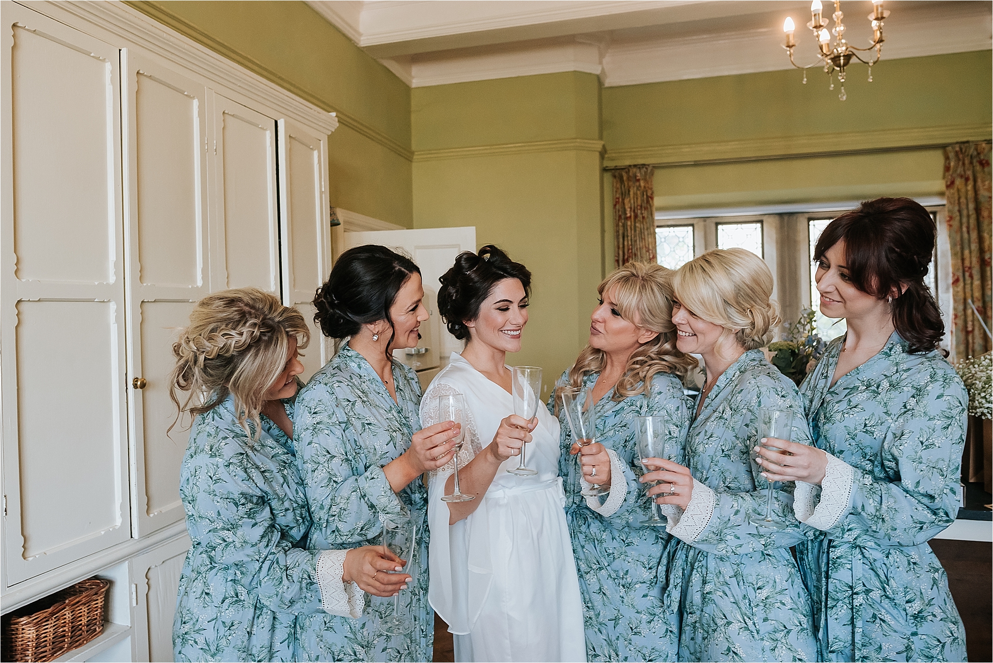 bridesmaids and bride before boho wedding