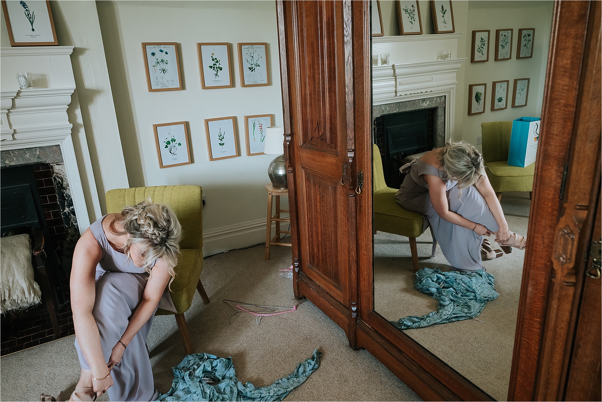bridesmaid puts her shoes on before wedding