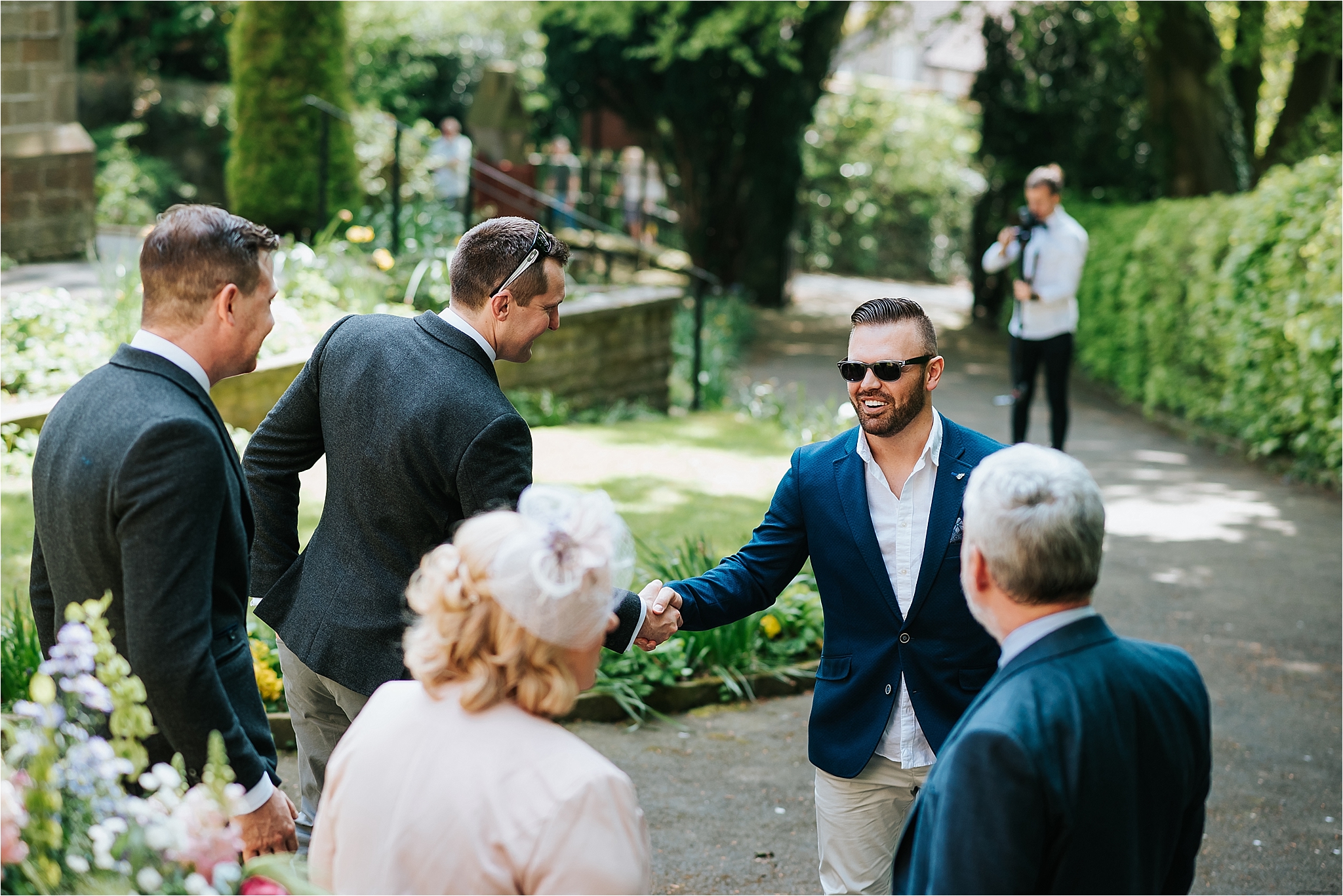 guests arrive at church for wedding 
