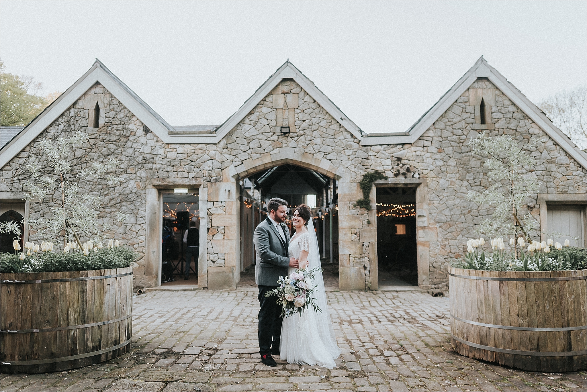 couple outside wyresdale park wedding barn 