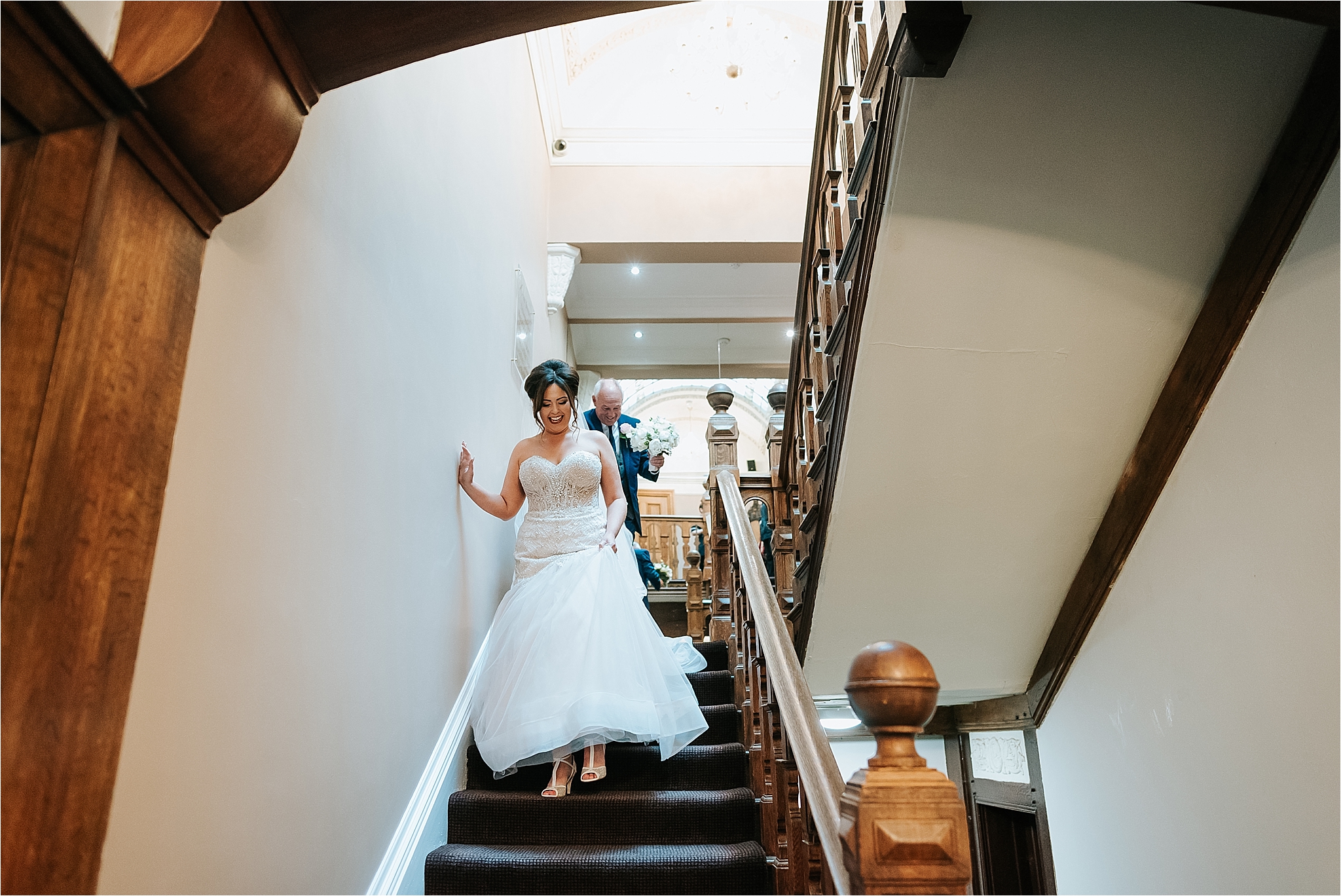 bride comes down stairs at west tower ormskirk