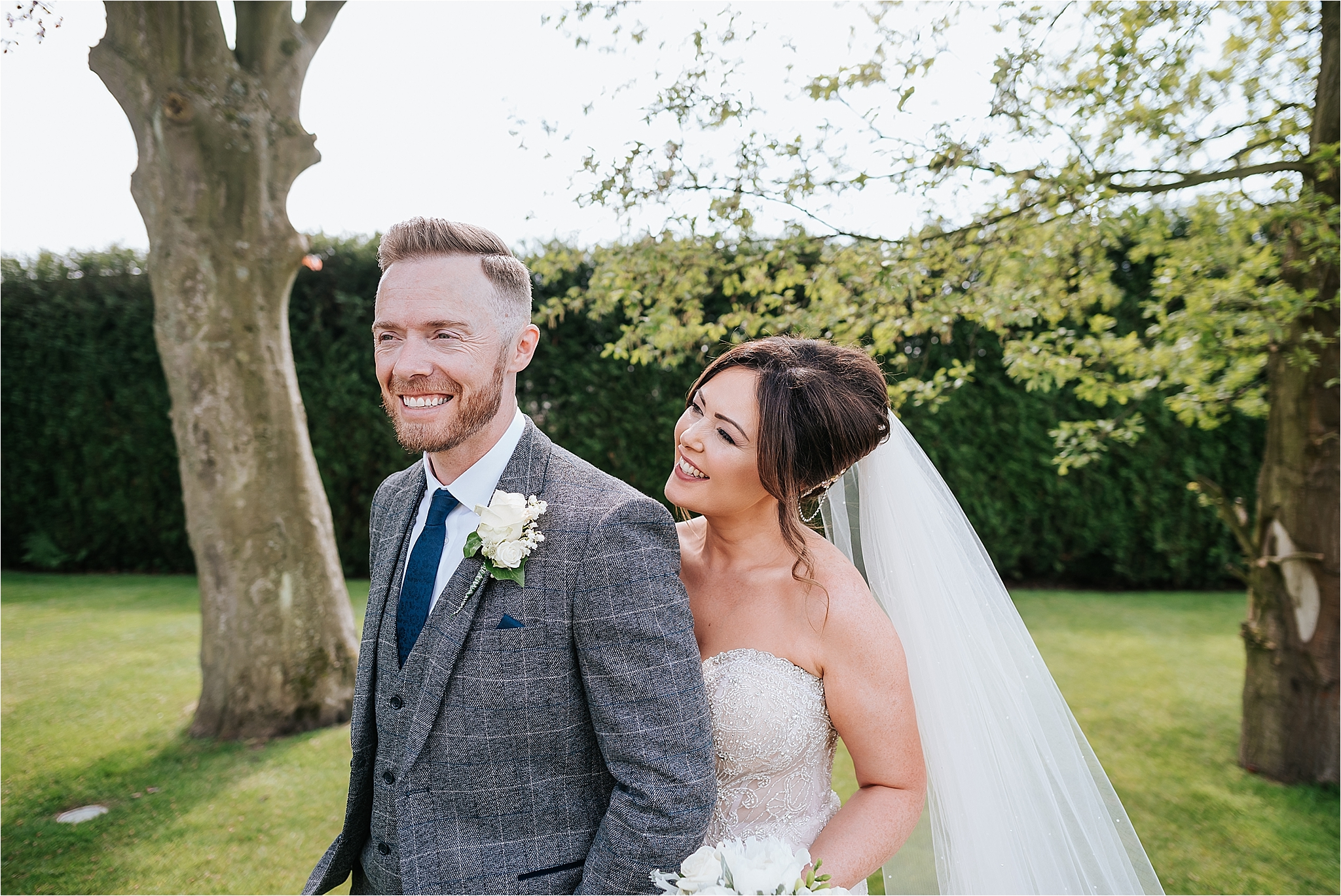 bride and groom laughing