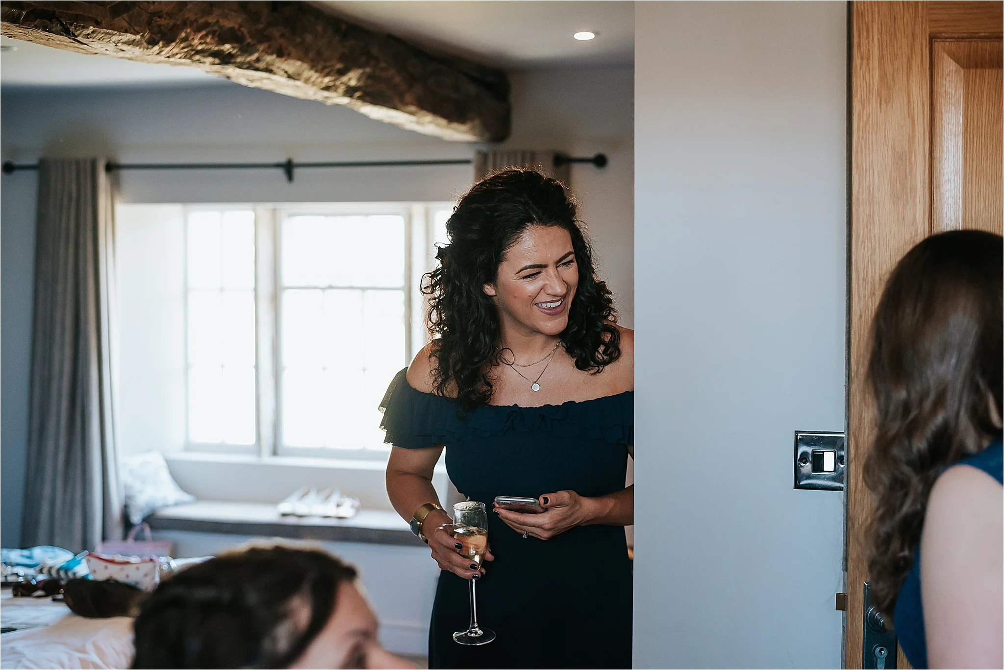 bridesmaid laughing at assheton arms