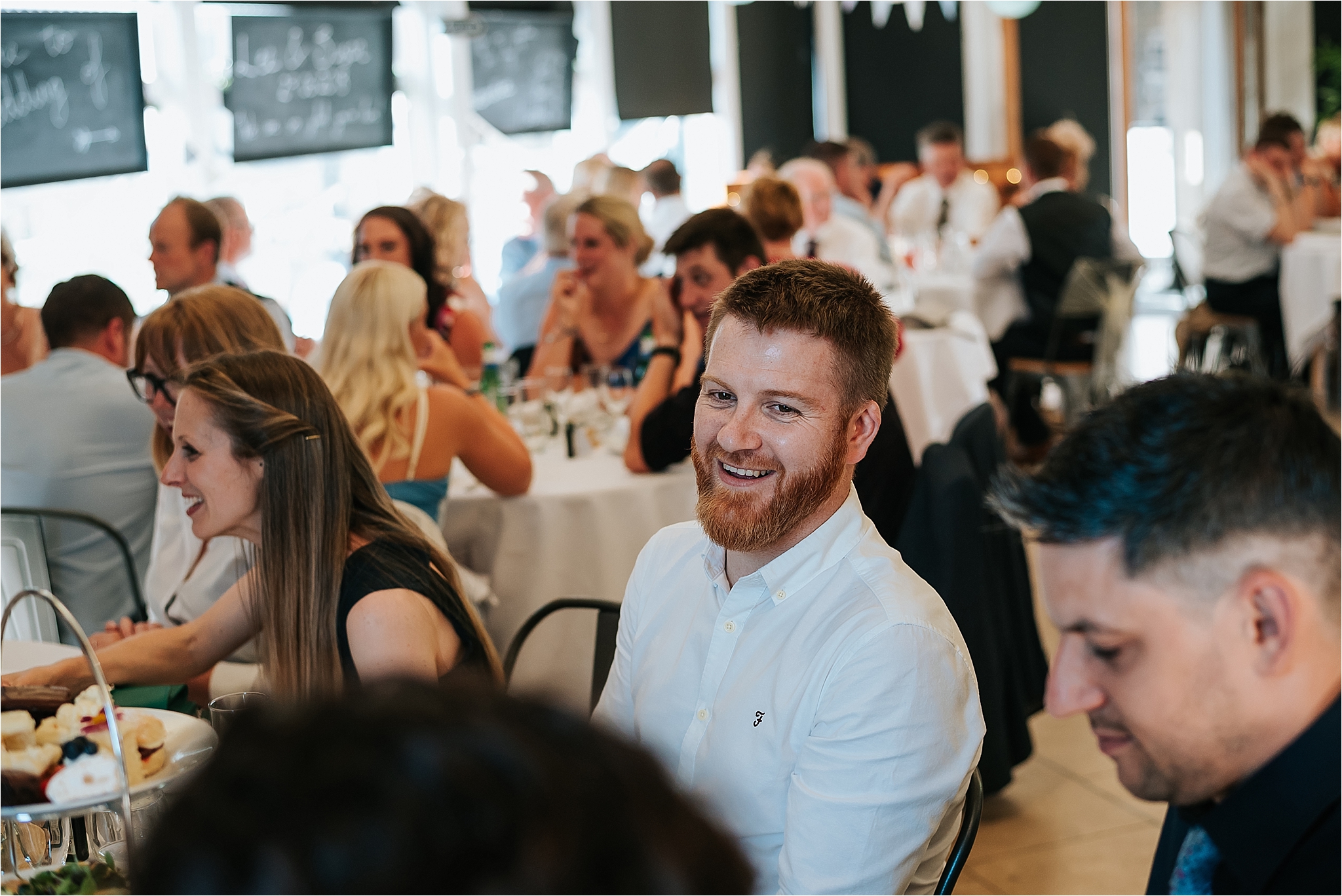 Guest laughing at wedding in clitheroe castle