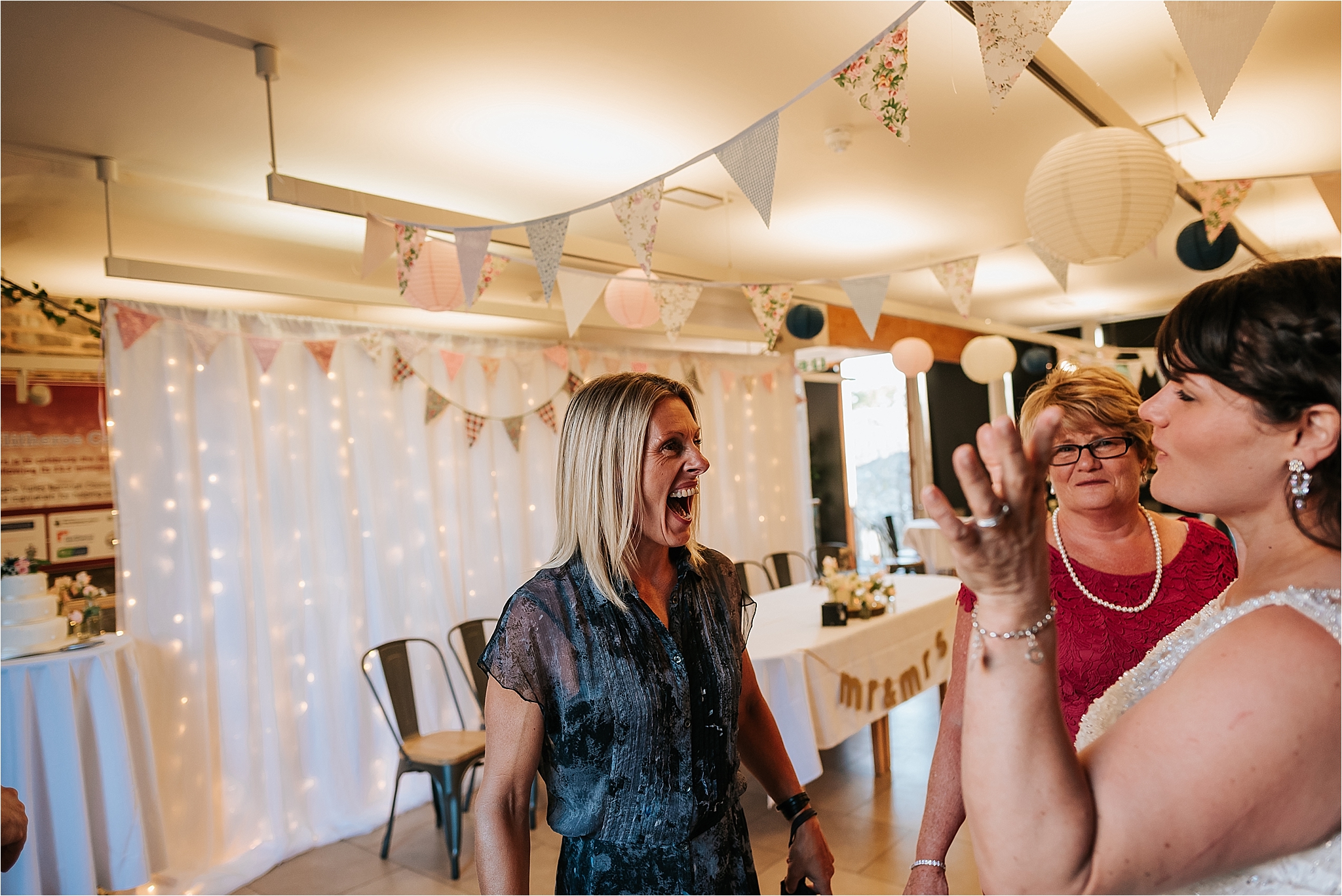 Guest laughing at wedding